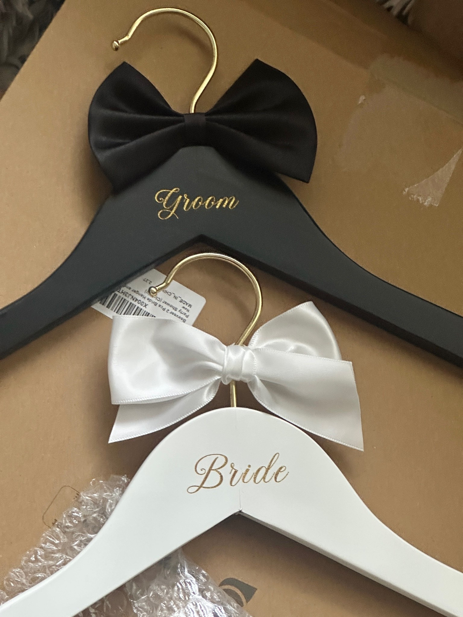 Another affordable find! We wanted my dress and his tux on a wooden hanger! These had a fun detail. #weddingdetails #bridalfinds

#LTKWedding