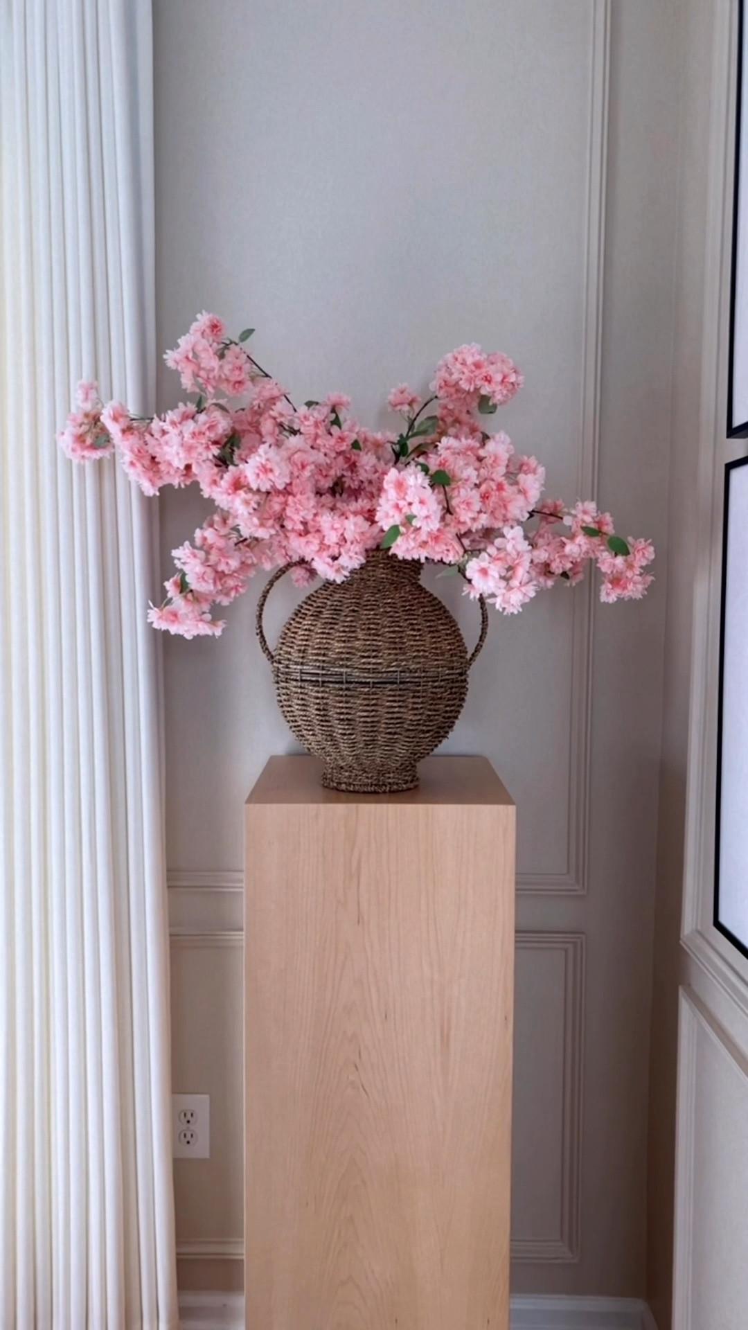 A new Spring Rattan Vase and Cherry Blossoms🌸
These are by far the most realistic stems I own and I use them every year for the season. 
I have 6 stems in this wicker/rattan vase.
#spring #cherryblossoms #springflorals #rattanvase #wickervase #seagrass #springdecor #homedecor #pedestal 

#LTKSeasonal #LTKHome