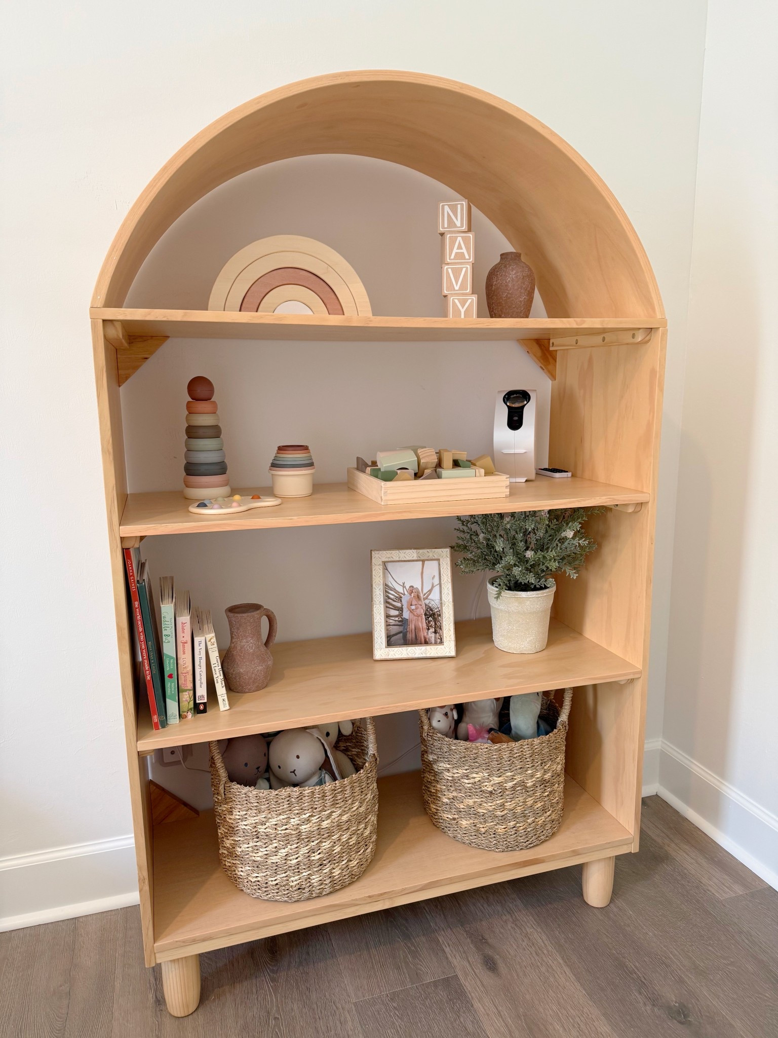 How adorable is this arched shelf! Easy to out together and perfect to display your kiddos books, toys and decor! It’s also budget friendly! 

Arched cabinet, wood cabinet, display cabinet, wood bookshelf, kids room, girls room, kids decor, neutral kids decor 


#walmart 

#LTKSeasonal #LTKHome #LTKKids