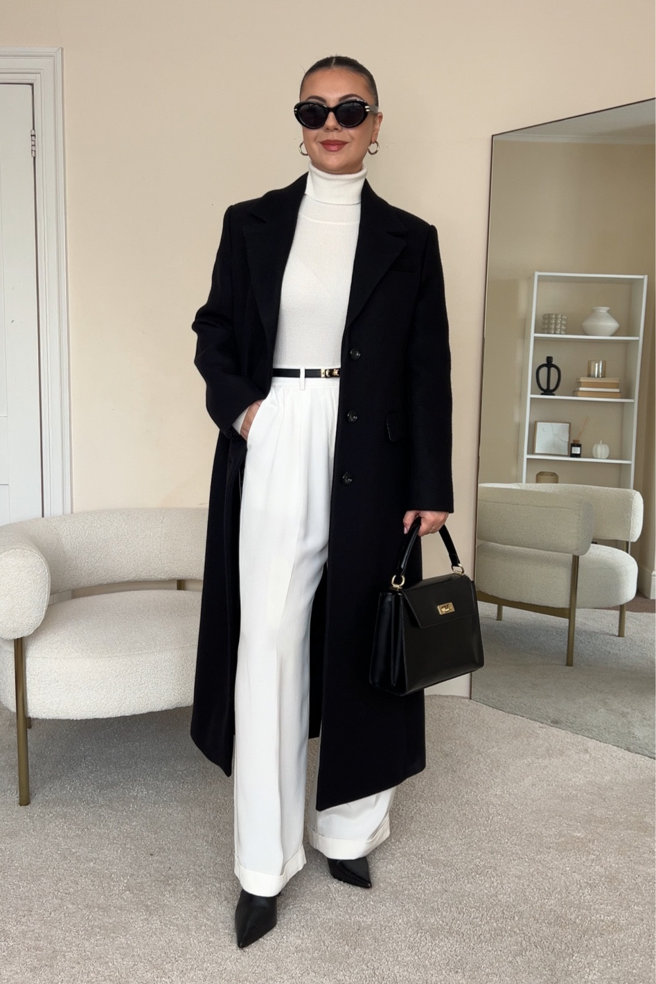 Smart casual winter outfit with a classic black coat.
Roll neck is from Mango, wearing size S.
Coat is from Mango, wearing size S.
Trousers are from LilySilk wearing size UK14.

#LTKeurope #LTKstyletip #LTKfindsunder100