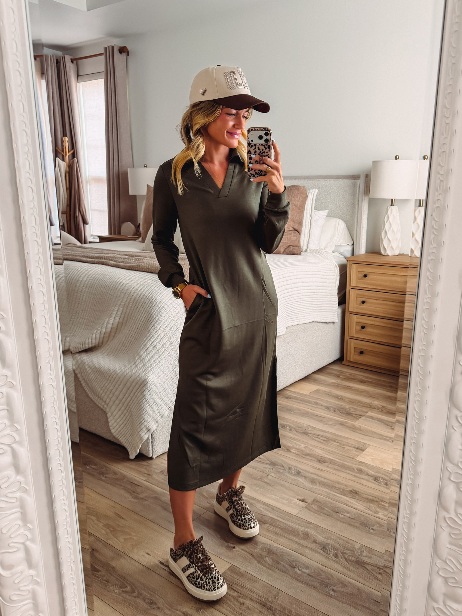 This olive midi dress is such an easy fall staple! I love the collared v-neck and long sleeves that make it feel elevated, and the side slits and pockets add the perfect practical touch. The soft knit fabric is so comfortable I could wear it all day. Perfect for school runs, coffee dates, or dressing up for dinner out! 

 #LTKootd #LTKmomlife #LTKSeasonal