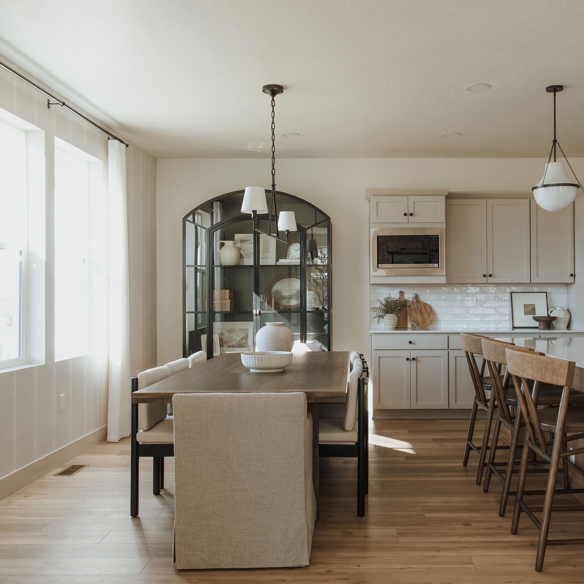 This kitchen feels complete with the beautiful black arched cabinet. It’s so fun to style. The dining table is one of our favorites and we are constantly asked about the barstools. 

#LTKSaleAlert #LTKmorningroutine #LTKHome
