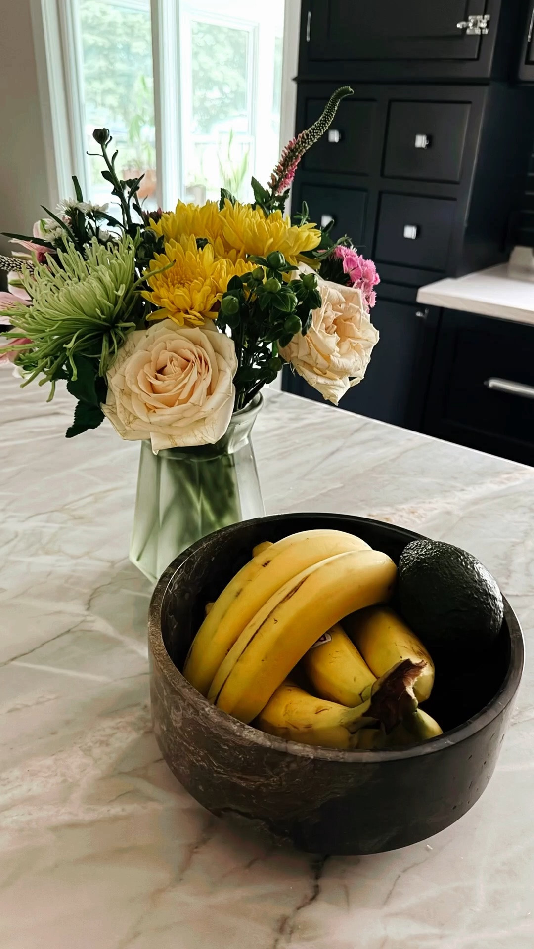 One of my favorite design principles is functional décor.

If you use something every day, it deserves to be beautiful.

Fresh flowers on the island. A bowl of fruit that’s always within reach. Olive oil, salt, pepper, and cooking utensils gathered on a tray instead of tucked away in a cabinet. Garden tomatoes becoming part of the kitchen’s color palette.

These aren’t decorations added after the fact. They’re everyday essentials, intentionally displayed.

The homes we remember weren’t perfect. They were personal. They reflected the people who lived there, the meals they cooked, the flowers they picked up on the way home, and the routines they repeated every day.

Beauty doesn’t have to be separate from function. When the objects you use every day are chosen with care, your home begins to tell your story without saying a word.

That’s the kind of home I’ll choose every time. 🤍

#LTKfoodie #LTKHome #LTKvlog