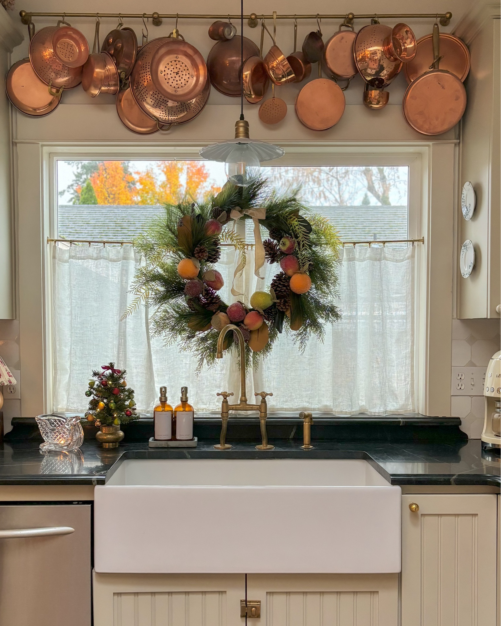Upcycled Christmas decor and a few thrifted finds make all the difference! These sugared fruit ornaments added to this wreath add such a cozy, classic vibe to the kitchen—proof that secondhand pieces can feel like magic.



And I have to mention, aren’t these tiny sugar fruit ornaments darling?! 
.
.
.
.
#christmasdecor #vintagechristmas #traditionalchristmasdecor  

#LTKSeasonal #LTKHome #LTKHoliday