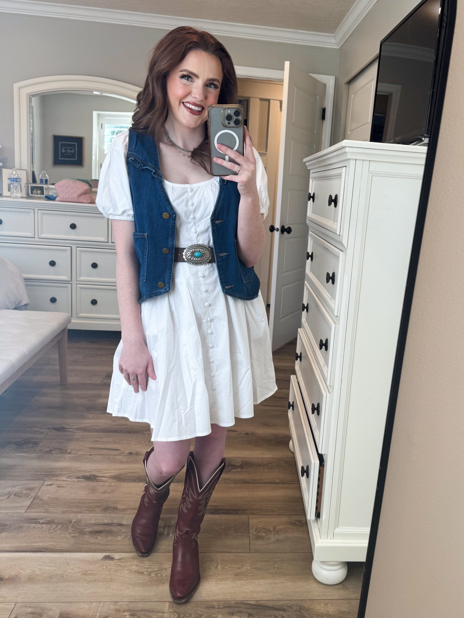 White button-front dress from Walmart for $26 and she’s giving everything. Styled it with a denim vest, turquoise concho belt, and cowboy boots for the ultimate western girl spring look. All linked on LTK! 🤠🤍
#LTKstyle #LTKunder50 #LTKstyletip #LTKshoecrush #westernstyle #cowgirlstyle #springoutfit #walmartfashion #walmartfinds #denimvest

#LTKFestival #LTKgrwm #LTKootd