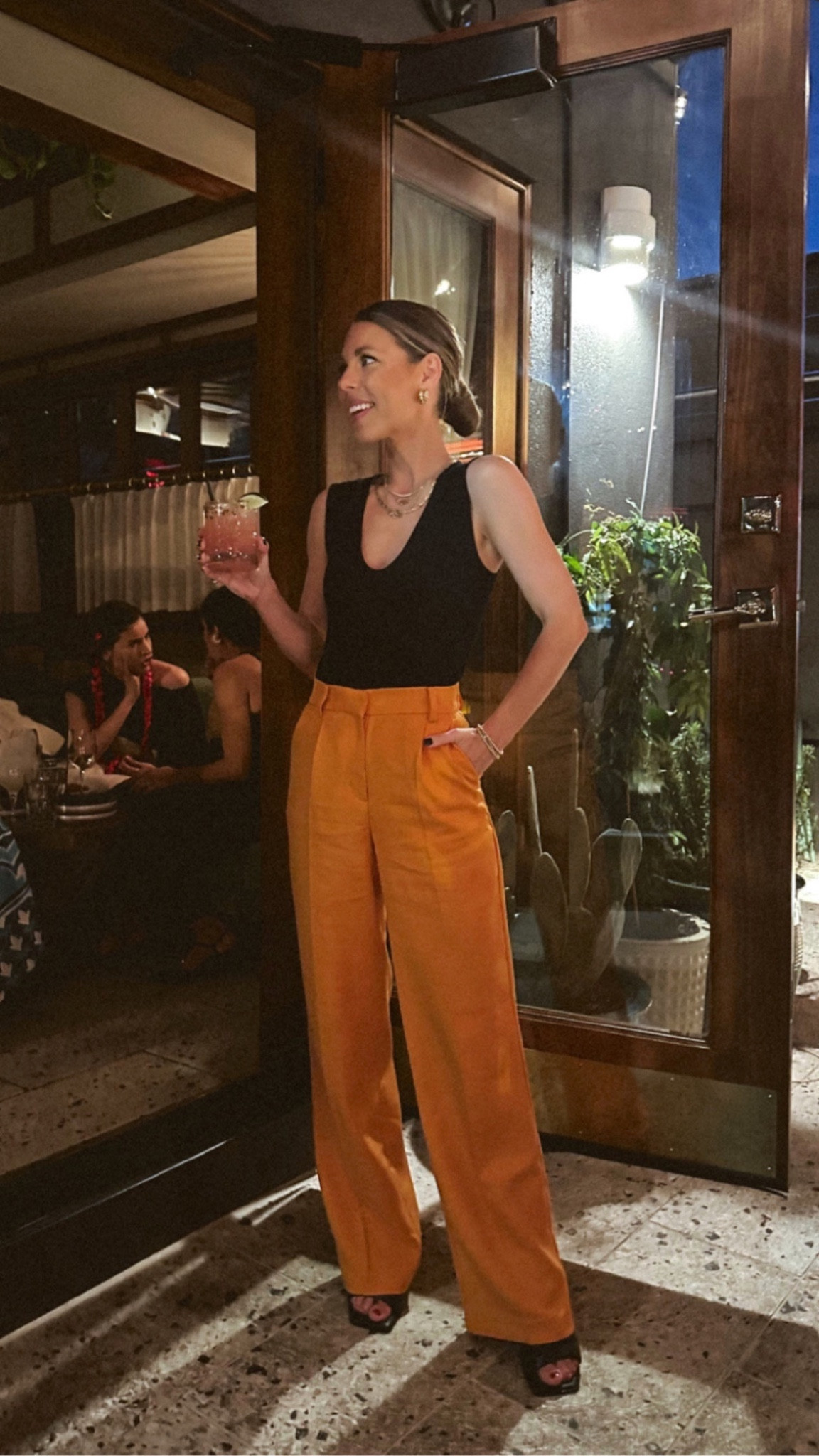 LOVE this new target bodysuit and H&M orange dress pants!! Wearing size xs in the black sleeveless bodysuit and size 2 in the high waisted pants. TTS! 

#LTKstyletip #LTKunder100 #LTKFind