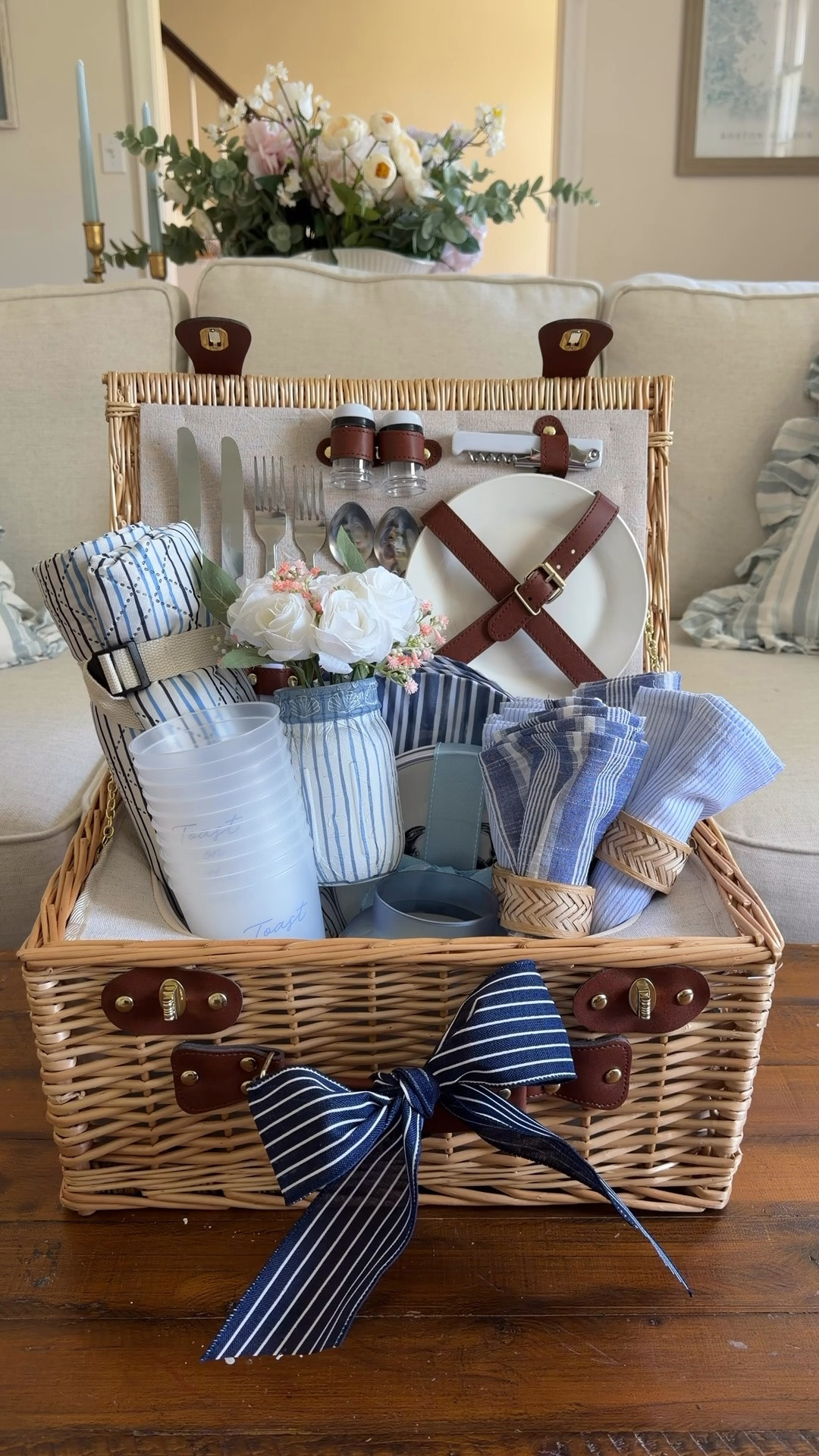The new coastal collection at @michaelsstores is giving all of the summer vibes and this picnic basket is so adorable. It comes with flatware, plates, a corkscrew and the basket itself is insulated. I filled it with a picnic blanket, plates, cups, a candle and made a vase using striped napkins and mod podge as the final touch! It’s picnic season and this makes the perfect gift for all that outdoor time coming up! 

Follow @michaelsstores and share how you #makeitwithmichaels!

#michaelsmaker
#everythingtomakeanything #makeitwithmichaels

#LTKSeasonal #LTKHome #LTKdayinmylife