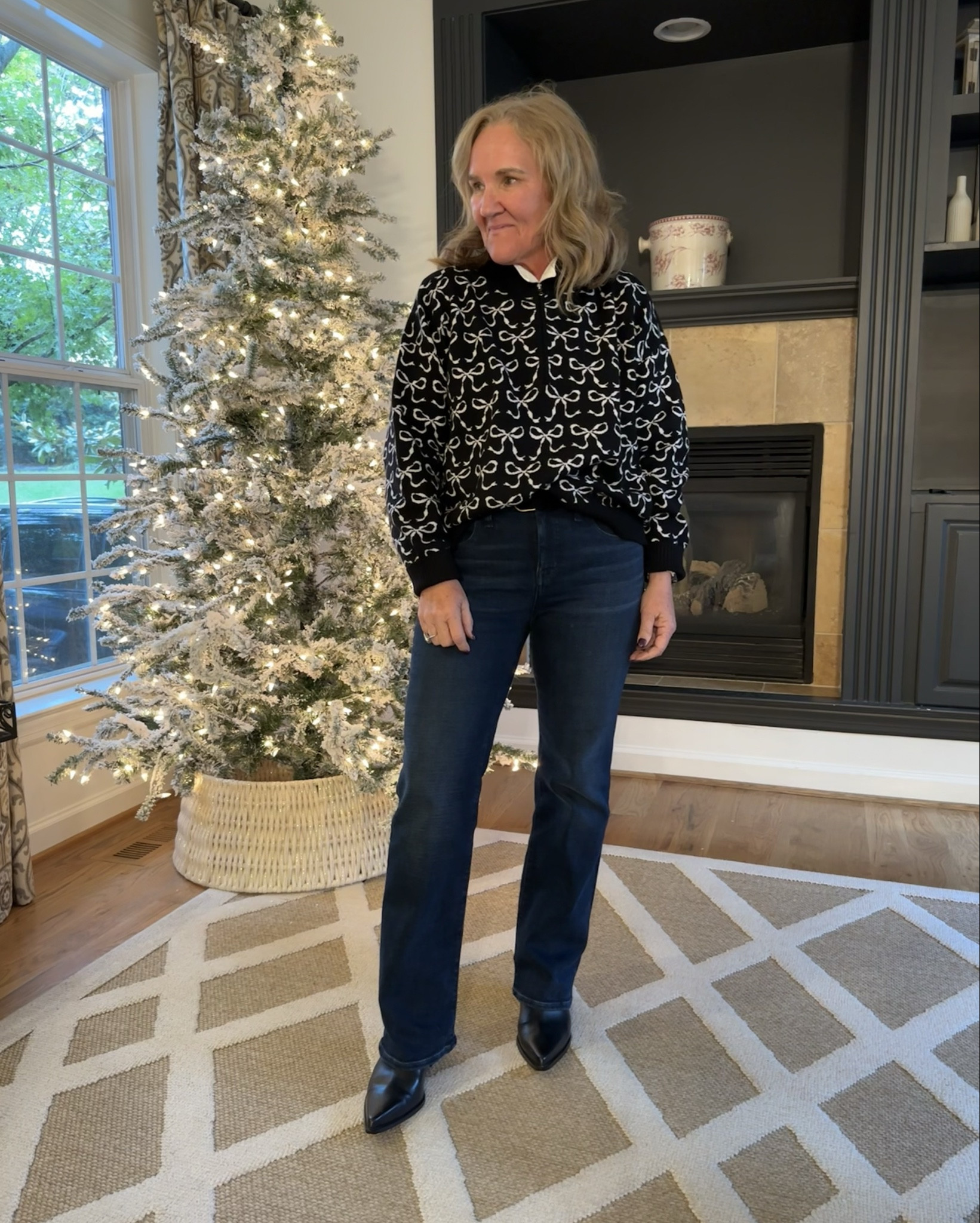 The cutest sweater! Wearing a large. It’s tts. I just sized up for a roomie look. 

Jeans size 29 petite. A very subtle flare. The denim is very supportive. 

Boots are waterproof. Size up a full size on these. 

Anthropology sweater, bow sweater, Madewell, jeans, flare, jeans, fall outfit, winter outfit

#LTKMidsize #LTKSeasonal #LTKOver40