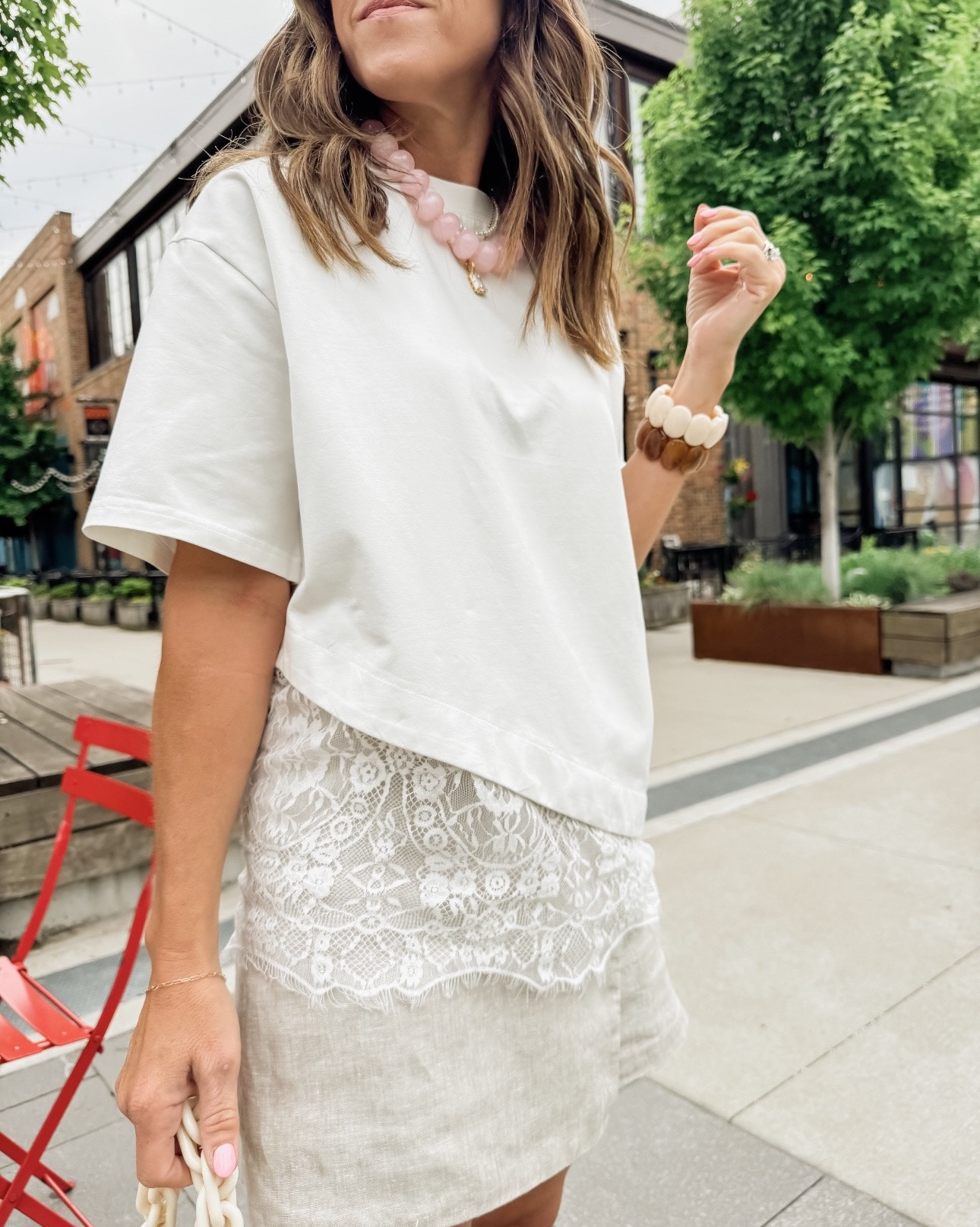 The lace detail on this tee is a fun touch! 
Small here. Comes in a few color ways. 
XS linen skort. If in between sizes, go down.

#LTKmomlife #LTKSeasonal #LTKOver40