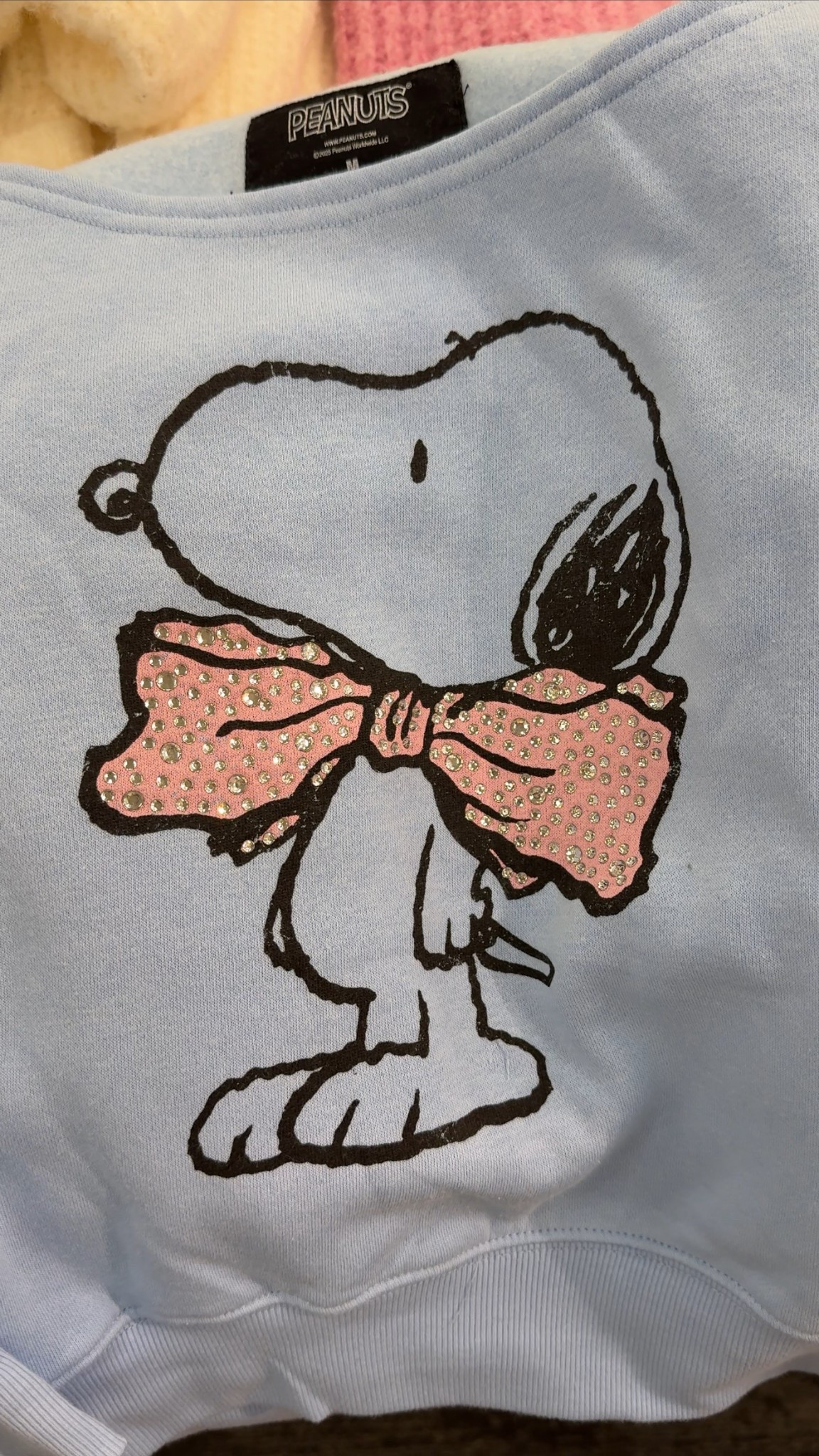 How adorable is this cute bow snoopy sweatshirt !!! So cute to not love this one ! 

#LTKootd #LTKGiftGuide #LTKHoliday