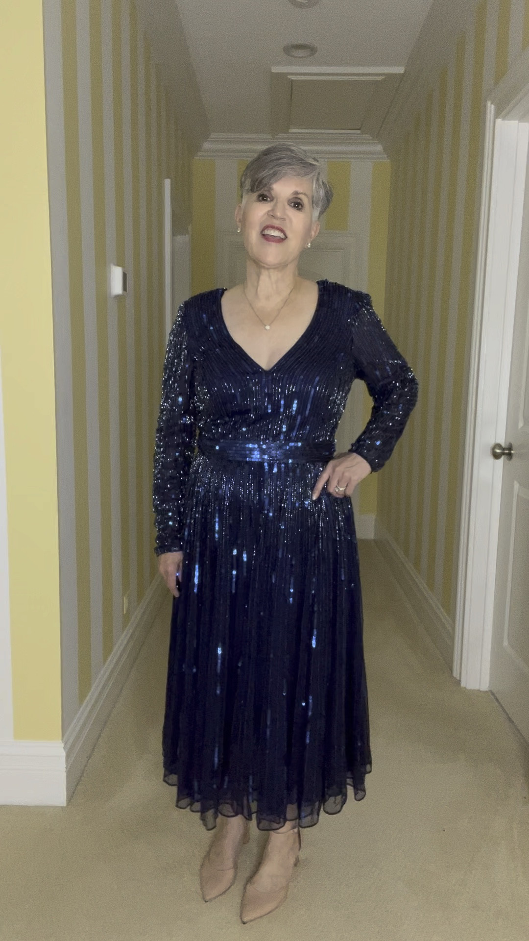 Great black-tie look for a charity event or dressy wedding 💒. 
Beautiful rich color with a neck-flattering v-neck as well as a fun swingy tea length skirt. Comfy long sleeves. By @macduggal.

#LTKHoliday #LTKstyletip #LTKwedding