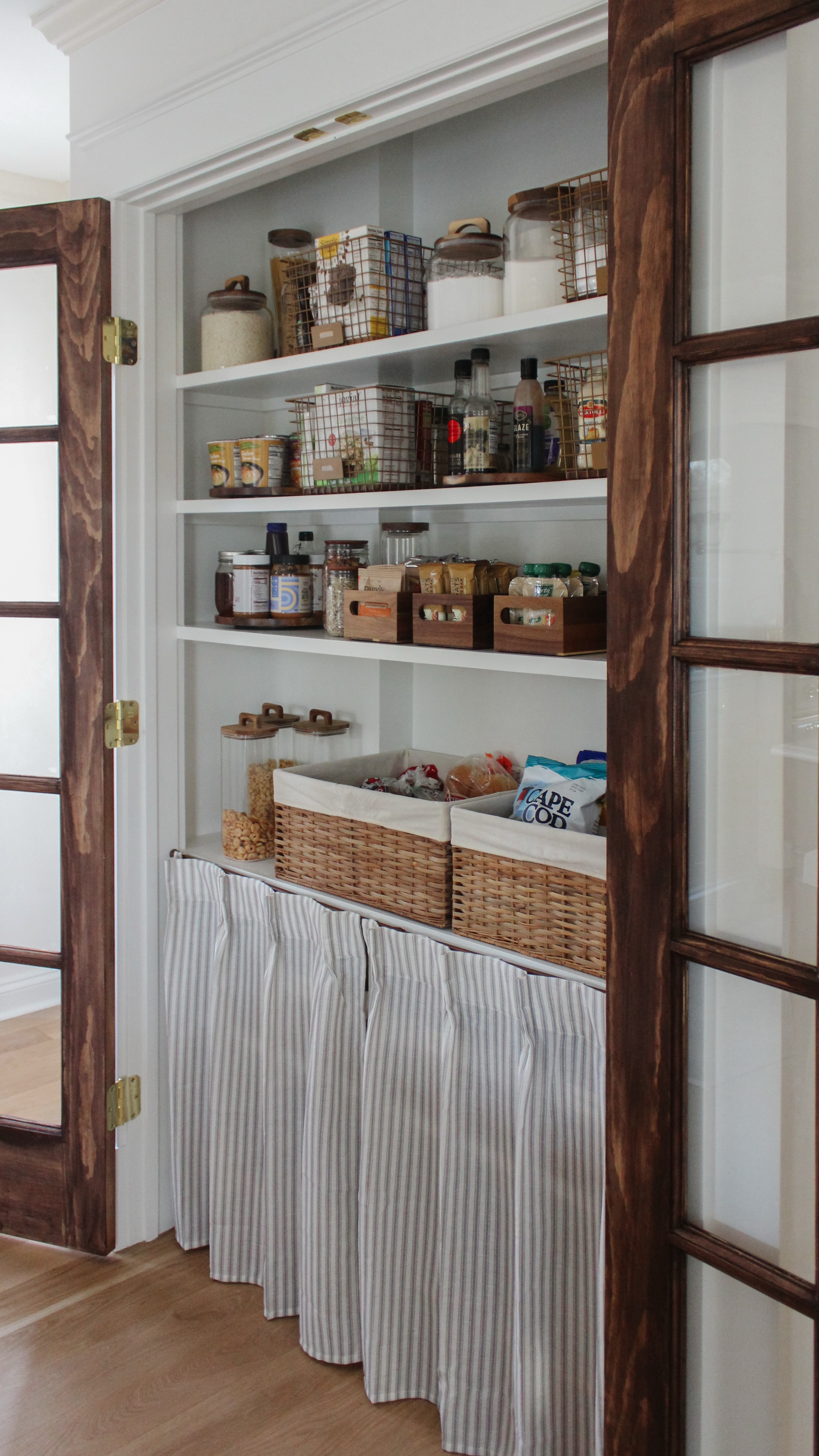 One thing I’ve learned throughout this process is that the pantry is the heart of the kitchen. Therefore, all the reason to organize it in a way that not only looks beautiful, but allows for meal planning & prep to be as smooth as possible!

Doing so felt as fast and stress free as this reel, all thanks to @systemsbysusie ! (partner) She and Katie provided such valuable insights along the way, teaching our family the thoughtful areas that are all the while easy to maintain. Can we also talk about the stunning containers, jars, bins, ALL the things she sourced?

You can view and shop in detail on my blog or Comment PANTRY below to receive a DM with the link to shop this post on my LTK ⬇ https://liketk.it/55zlX
•
•
•
Thanks to @intuitive.design_ for the pantry shelving plans 
•
•
#pantryorganization #pantrygoals #pantrymakeover #pantryideas #pantrybeforeandafter #homebeforeandafter #pantryinspo #homeorganizing #homeorganizationtips #kitchenorganizationideas #traditionalhome #classicstyle