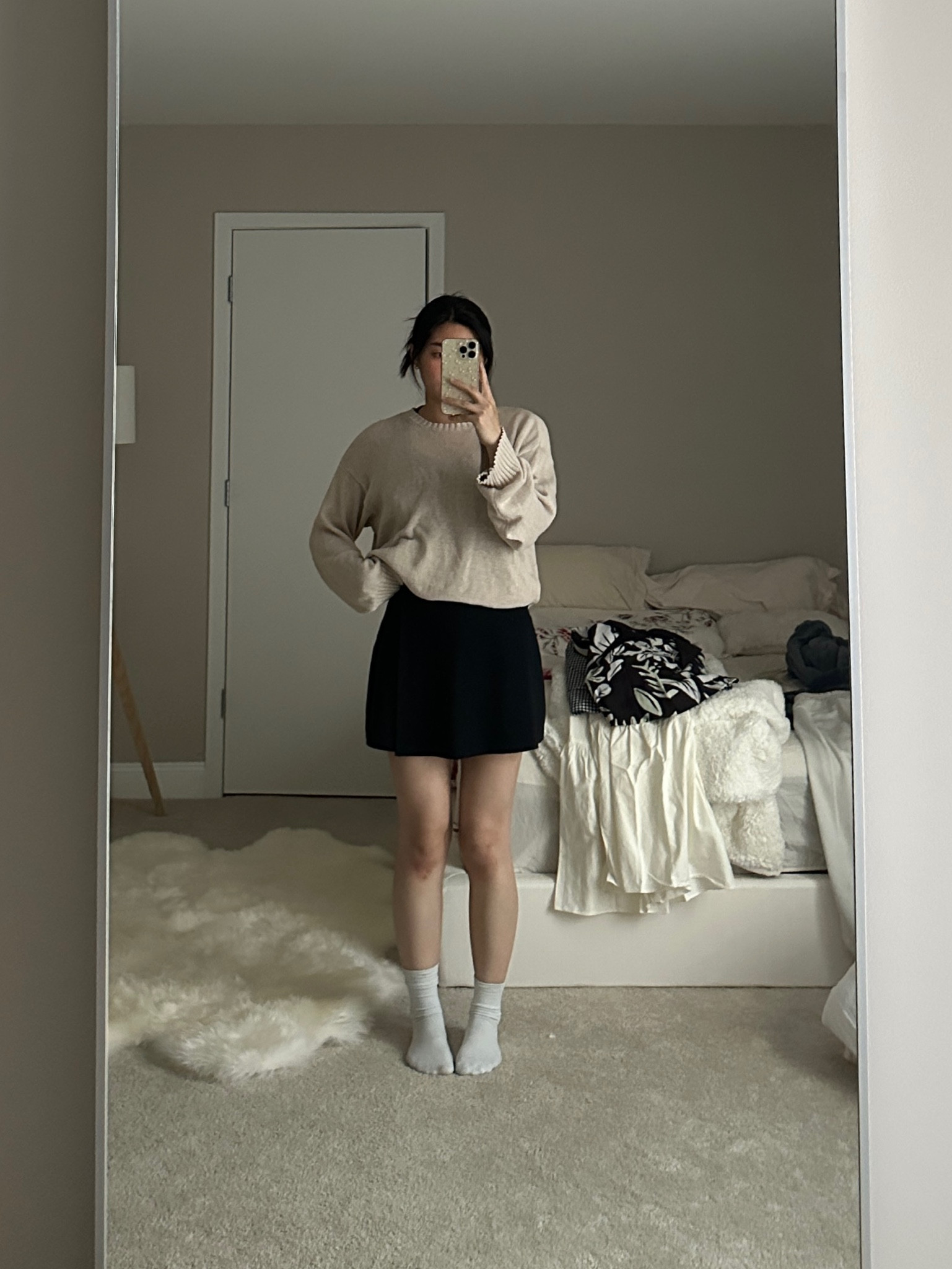 neutral and chic summer outfit with a beige pullover and black skort. linking the exact black skort!

#LTKstyletip #LTKSeasonal #LTKunder50