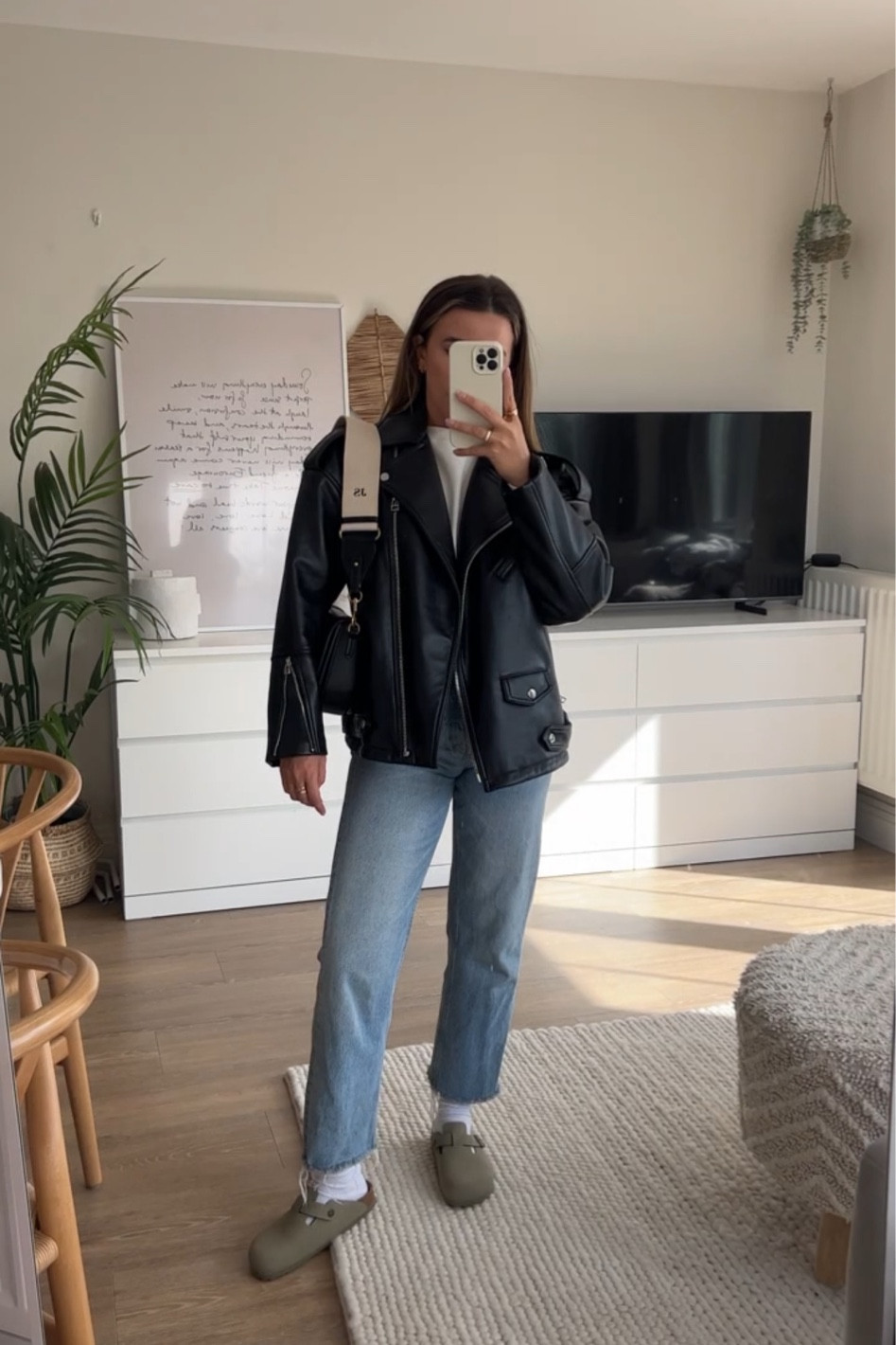 Styling my birkenstock boston clogs in vegan khaki with an oversized leather jacket and some straight leg blue denim jeans from asos - winning combo! For the basic tee, it’s actually a bodysuit from Abercrombie! 

#LTKunder50 #LTKstyletip #LTKeurope