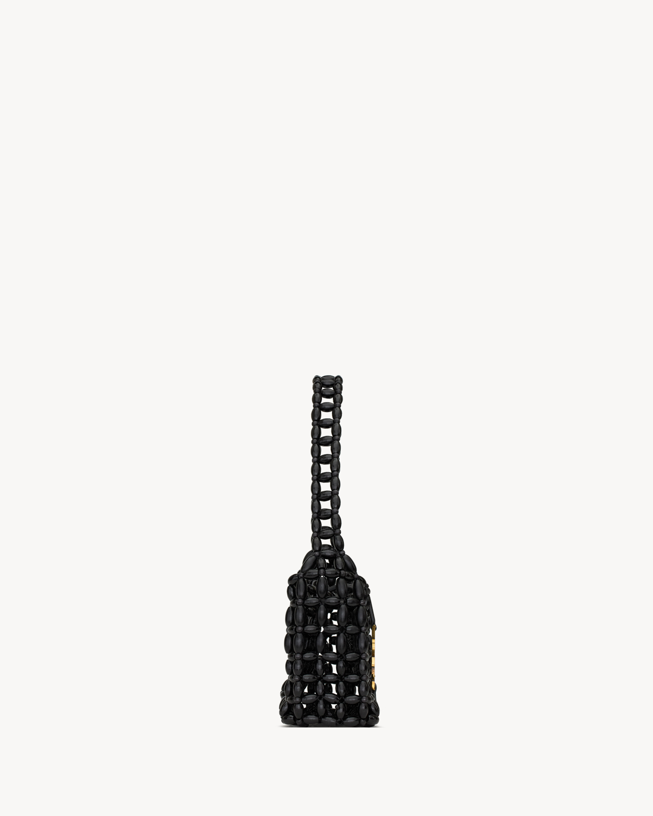 shoulder bag in wood beads, featuring a leather tab closure decorated with the CASSANDRE. Both co... | Saint Laurent Inc. (Global)