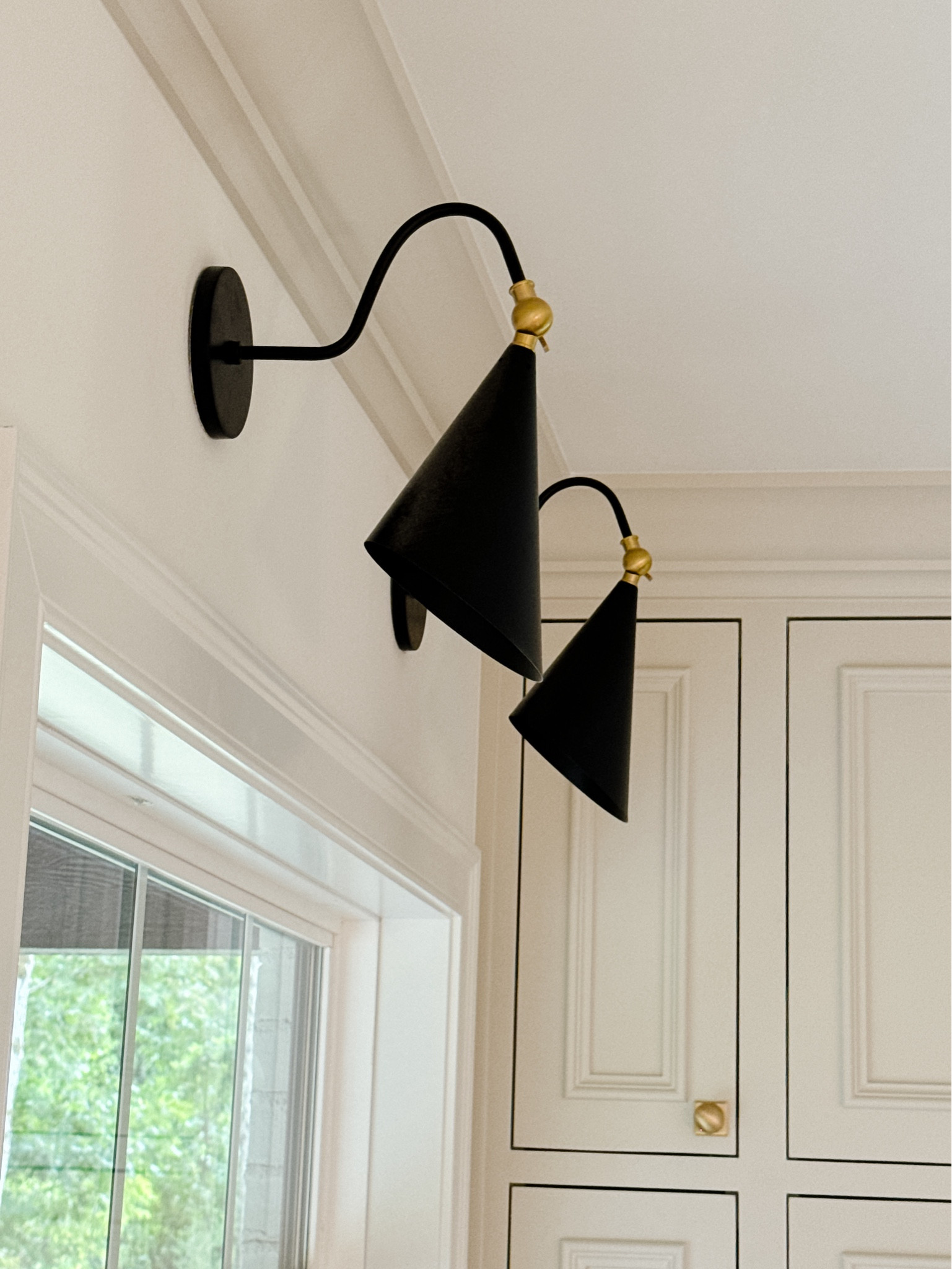 Sconce / sconces / black sconce / black and gold sconce / gooseneck sconce 

#LTKFindsUnder100 #LTKHome #LTKStyleTip