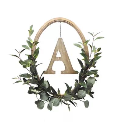 Bee & Willow™ Home 20-Inch Oval Wood Hoop Wreath with Faux Greenery | Bed Bath & Beyond | Bed Bath & Beyond