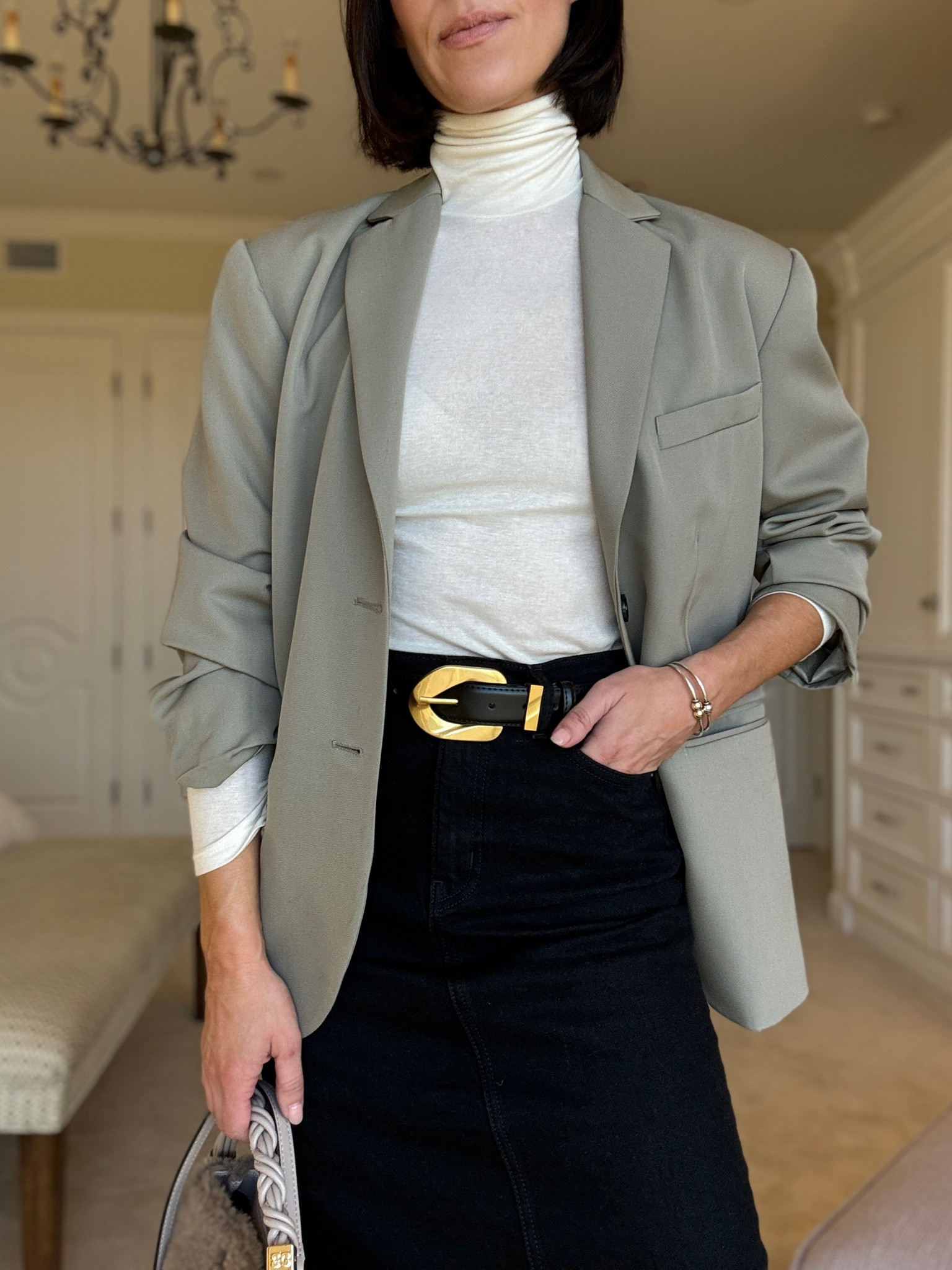 Starting the week off with a classic go to look for this time of year. Bought this maxi denim skirt before Christmas and have been wearing it non stop. Styled it with a tissue turtleneck and my favorite oversized blazer.

#LTKstyletip