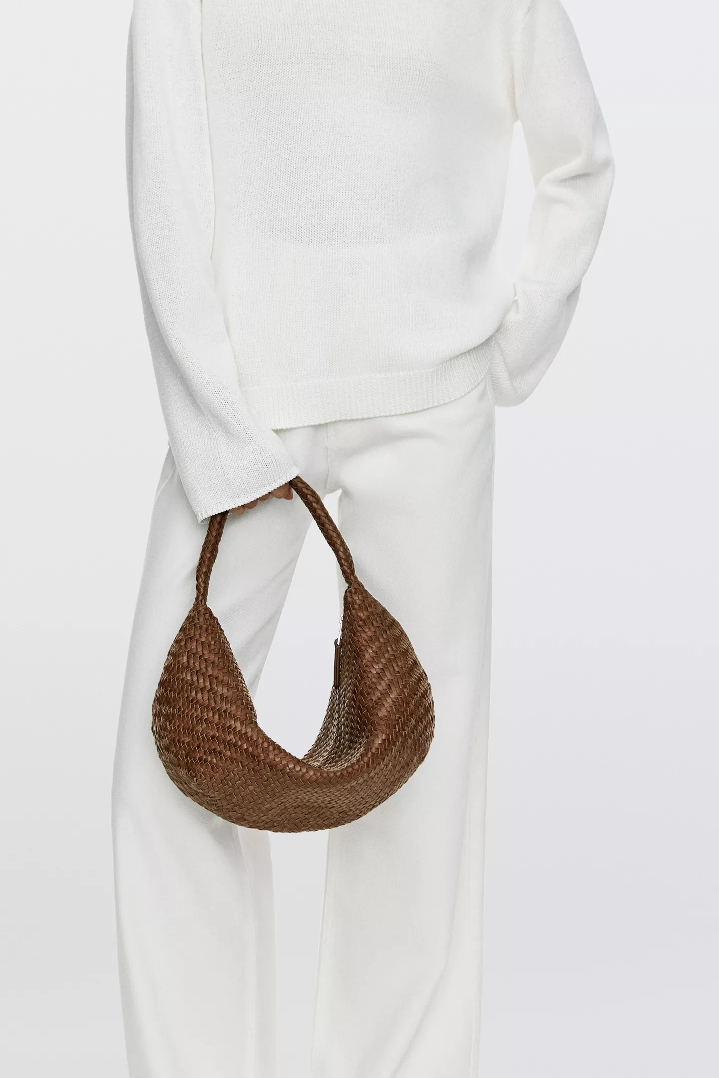 VIEW LOOK
Braided leather half-moon bag

 £299  Colour:  Leather  +2  Add to basket | Massimo Dutti UK