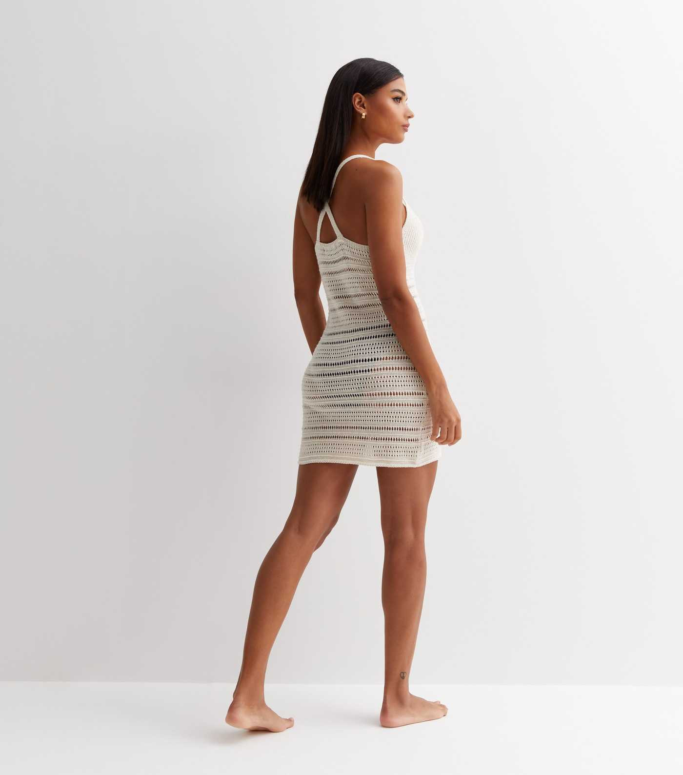 Off White Crochet Strappy Mini Dress
						
						Add to Saved Items
						Remove from Saved Item... | New Look (UK)