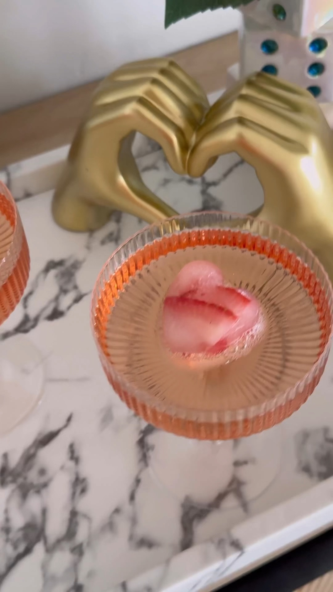 🌹✨ Elevate your Valentine's Day drinks with our Rose Ice Cube Tray! 🥂 Easy to use, just fill the tray with water, pop in your rose petals or berries, and freeze for a touch of romance in every sip. 
Grab Yours Here: https://amzn.to/3OzxJPO

🍓💖 I fill mine with strawberries and sparkling water for a refreshing twist, but the options are endless! 🌟 You can get creative with raspberries, rose petals, and more, adding a burst of color and flavor to your beverages.

Once they freeze, these delicate rose-shaped cubes are ready to dazzle. 💫 Whether you're serving up mocktails or mixing cocktails, these beauties are the perfect way to show off your Valentine's Day spirit. 💕🍹 Imagine the magic they'll bring to your champagne flutes or gin and tonics! ✨ And the best part? Once they freeze, you can use them with any drink or cocktail, making every sip a celebration of love. 🥰 Cheers to love, laughter, and enchanting drinks with our Rose Ice Cube Tray! 🌹🥂 #valentinesday #ValentinesDayChallenge #founditonamazon #amazonfinds #amazonkitchenfinds #icecube 

#LTKhome #LTKVideo #LTKMostLoved