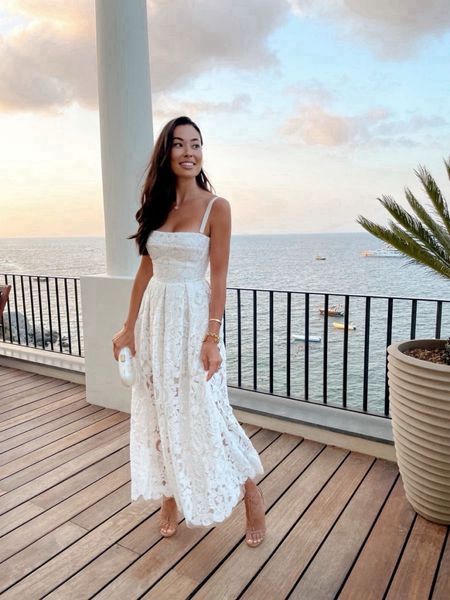 Kat Jamieson wears a white eyelet dress in Capri Italy. What to wear on vacation, spring outfits, bridal. 

#LTKparties #LTKwedding #LTKSeasonal