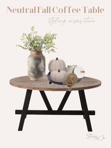 Neutral Fall coffee table styling. This rustic coffee table pairs well with a vintage looking vase filled with greenery.  Add a black tray, decorative beads, and some ceramic pumpkins. 

Fall style, fall home decor, fall decorations, coffee table styling

#LTKhome #LTKunder50 #LTKstyletip