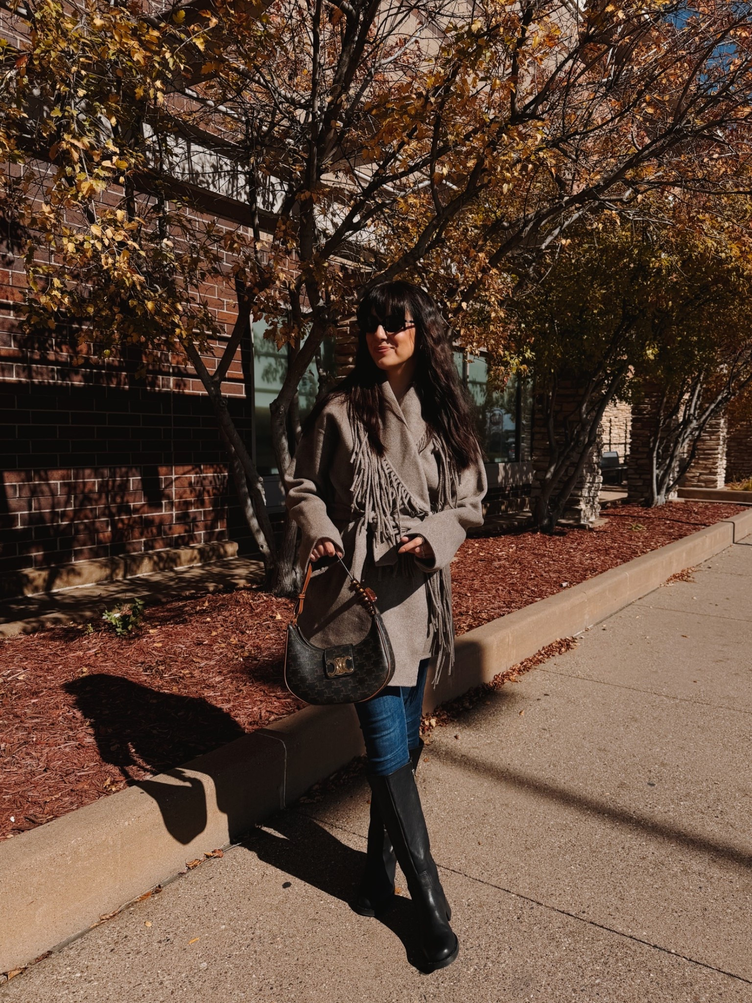 Easy fall outfit with a belted fringe jacket !! Jeggings are perfect for tall boots! This pair on sale! & use code FRIEND for 30% off my jacket! Petite friendly 

Xs jacket, 2short jeans, blondo boots tts

#LTKSeasonal #LTKPetite #LTKSaleAlert
