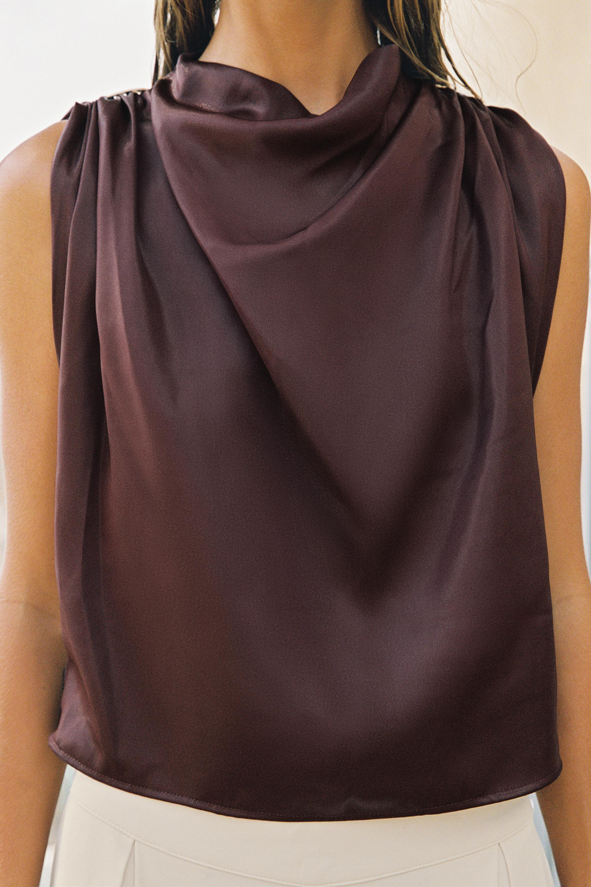 Fluid-neck bodysuit with sleeveless design and gold-tone appliqu\u00e9s on the shoulders. Feature... | Zara US