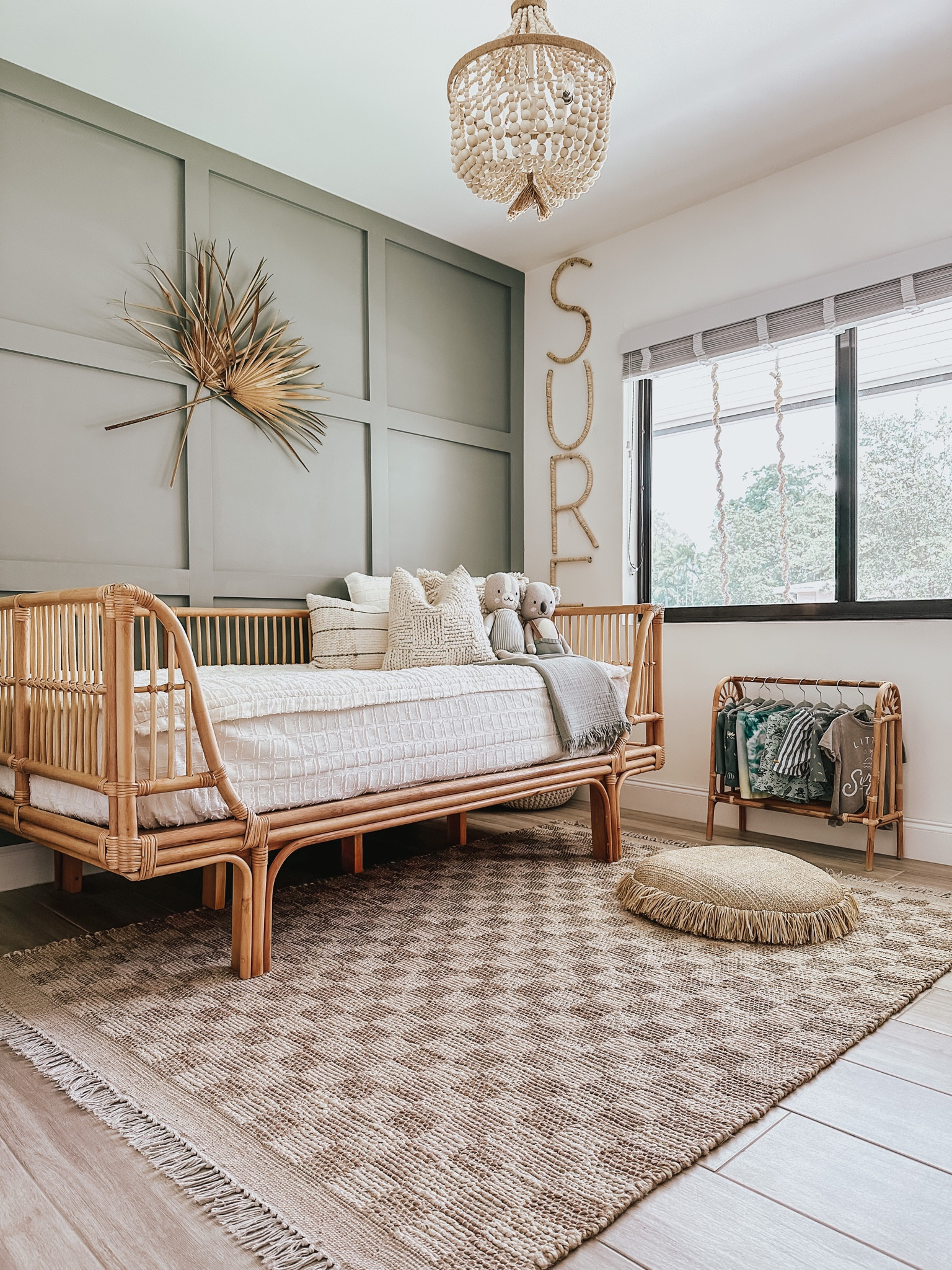 Boys room inspo #kidsroom #boysroom #cane #rattan #daybed #kidsbed #twinbed #coastaldecor #beachhouse #florida #miami #palmfrond #beadedchandelier #playroom #surf 

#LTKkids #LTKhome #LTKfamily