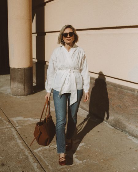 A spring outfit I can’t wait to wear again. I love the belted take on a classic white button down. It just makes the whole look a tad bit more fun  | work outfit | date night outfit | jeans 

#LTKSeasonal