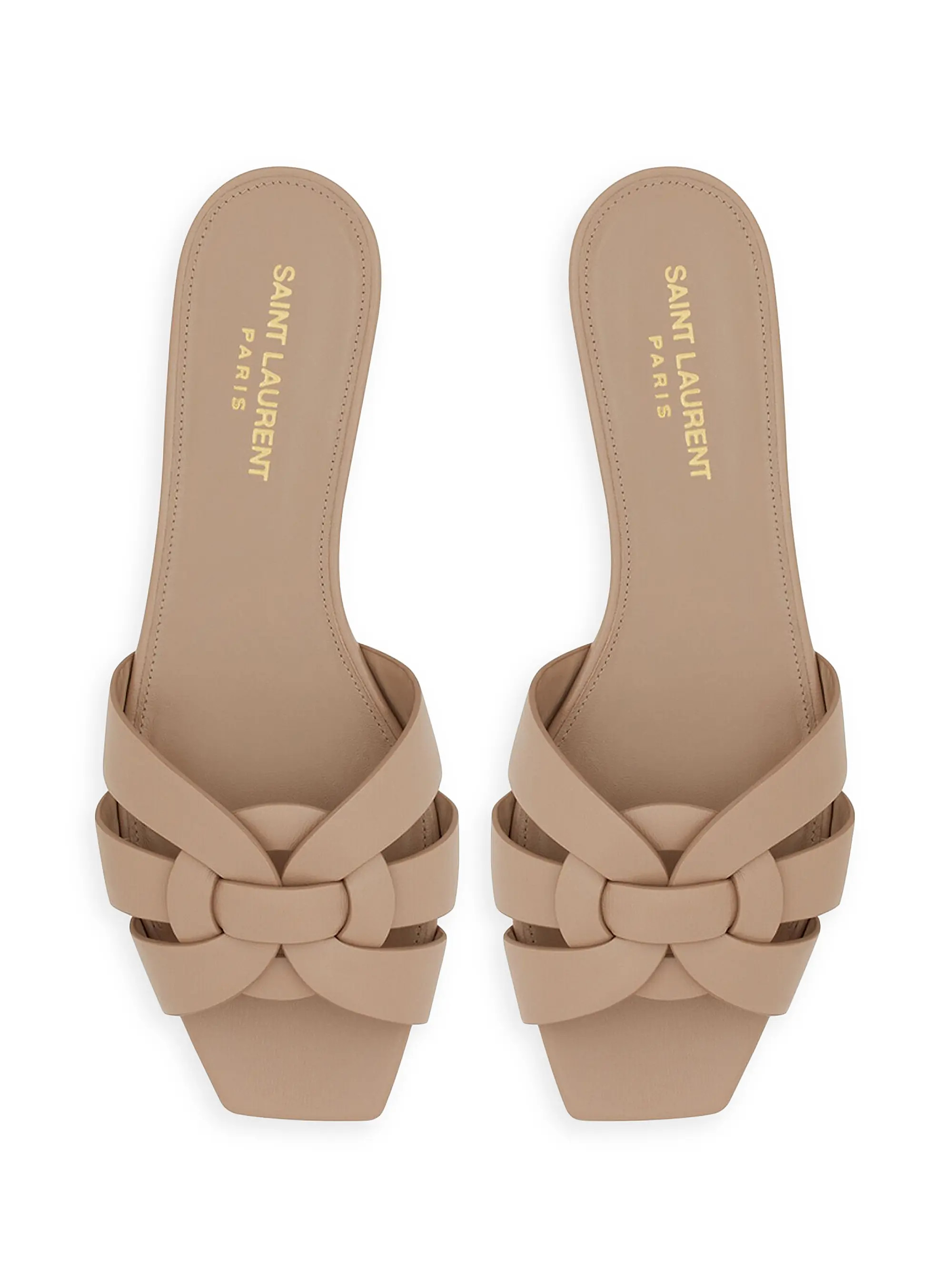 DetailsSlip-on flat mules with a square toe and intertwining straps.Leather soleTotal heel height... | Saks Fifth Avenue