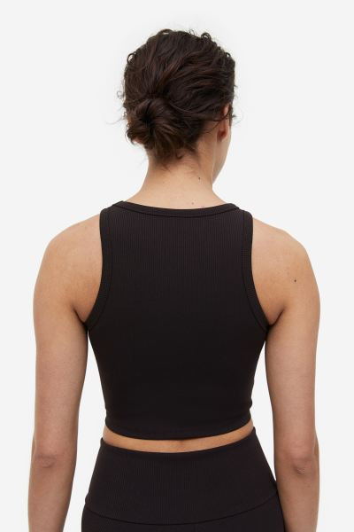 DryMove™ Cropped sports vest top - Dark brown - Ladies | H&M GB | H&M (UK, MY, IN, SG, PH, TW, HK)