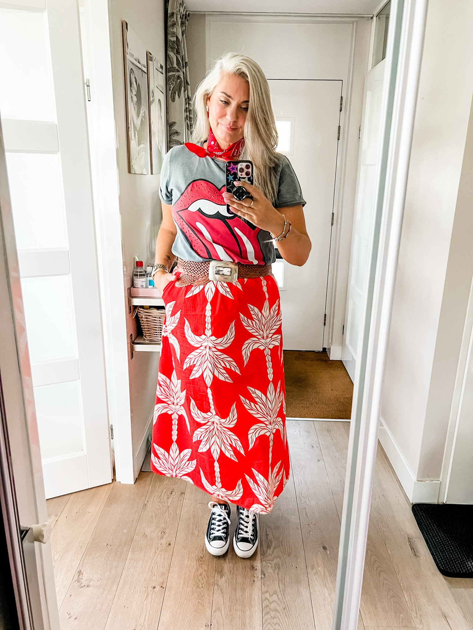 Ootd - Sunday. The last warm day probably. Wearing an old Rolling Stones t-shirt, with a red skirt with palm trees, black Chucks, red bow earrings and a red bandana. 



#LTKstyletip #LTKnederlands #LTKeurope