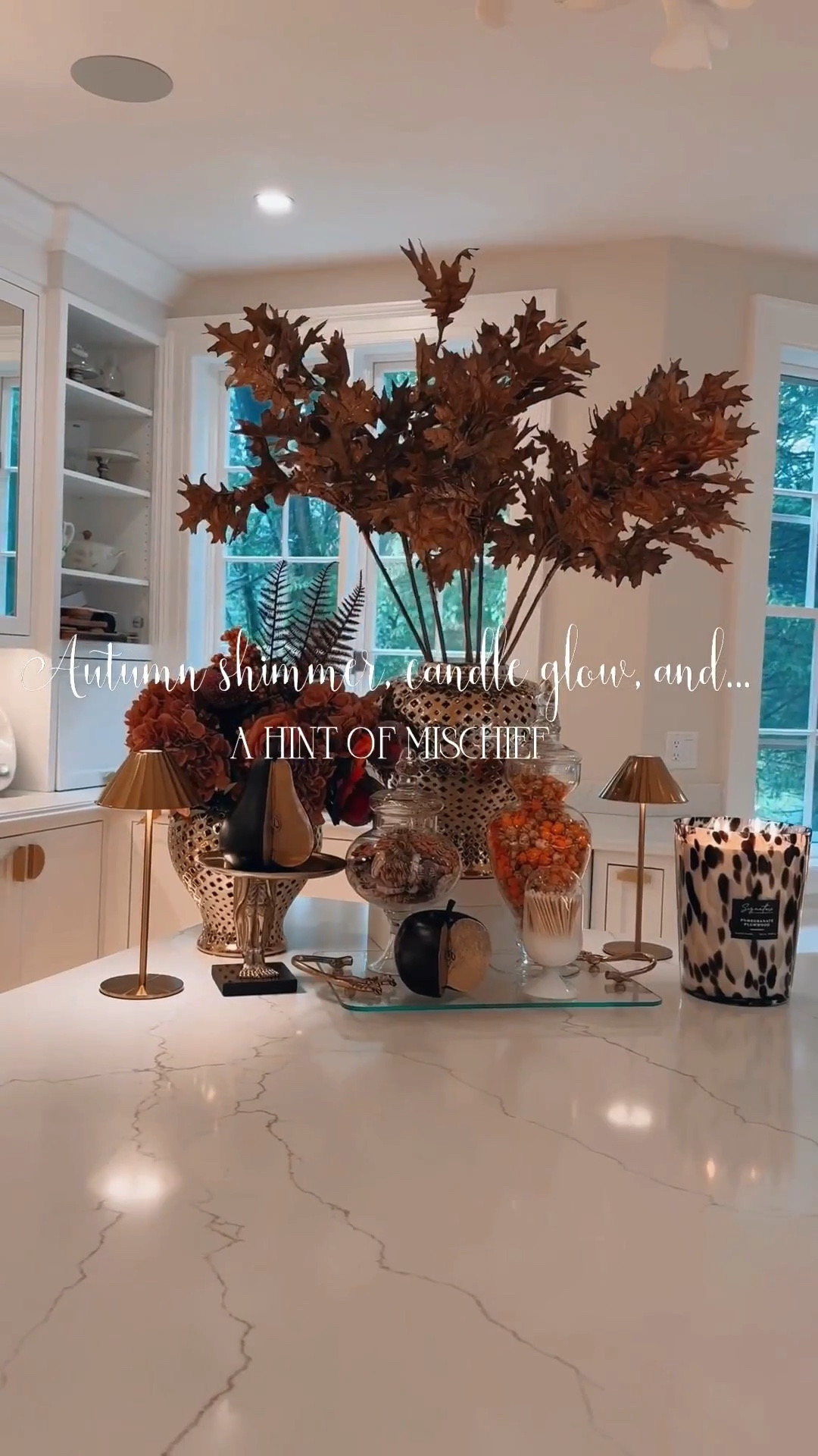 Fall meets Halloween — my kitchen edition. 🍁
I treat my island like a stage where the season performs its best scenes: a little shimmer from amber stems, a touch of spice from pumpkin popcorn, and the soft glow of a candle that burns for hours while I “accidentally” snack on chocolate pretzels.
Each piece is intentional — something tall, something low, a little tray of indulgence, and always a candle. It’s not just décor, it’s atmosphere — the kind that makes even an ordinary evening feel like a private autumn soirée🕯️🍂

#LTKSeasonal