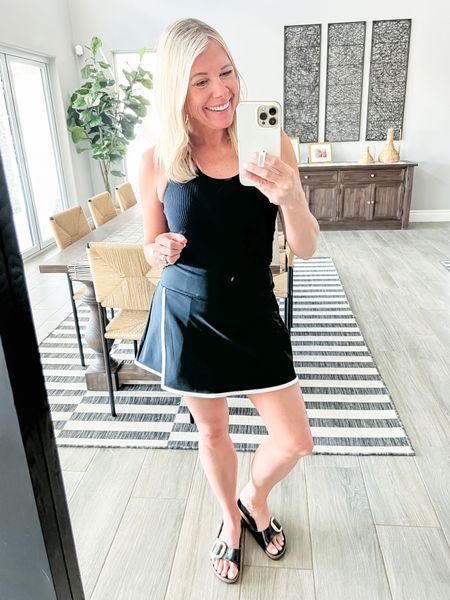 Love this black skirt with white trim with a black ribbed tank and birkenstock sandals. Size small everything  

#LTKSeasonal #LTKsalealert #LTKfitness