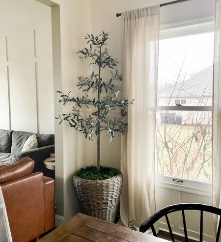 Found a new spot for my favorite faux tree from Target.  Here are some other faux tree options as well as some large baskets to put a tree in.  

#LTKSeasonal #LTKFind #LTKhome