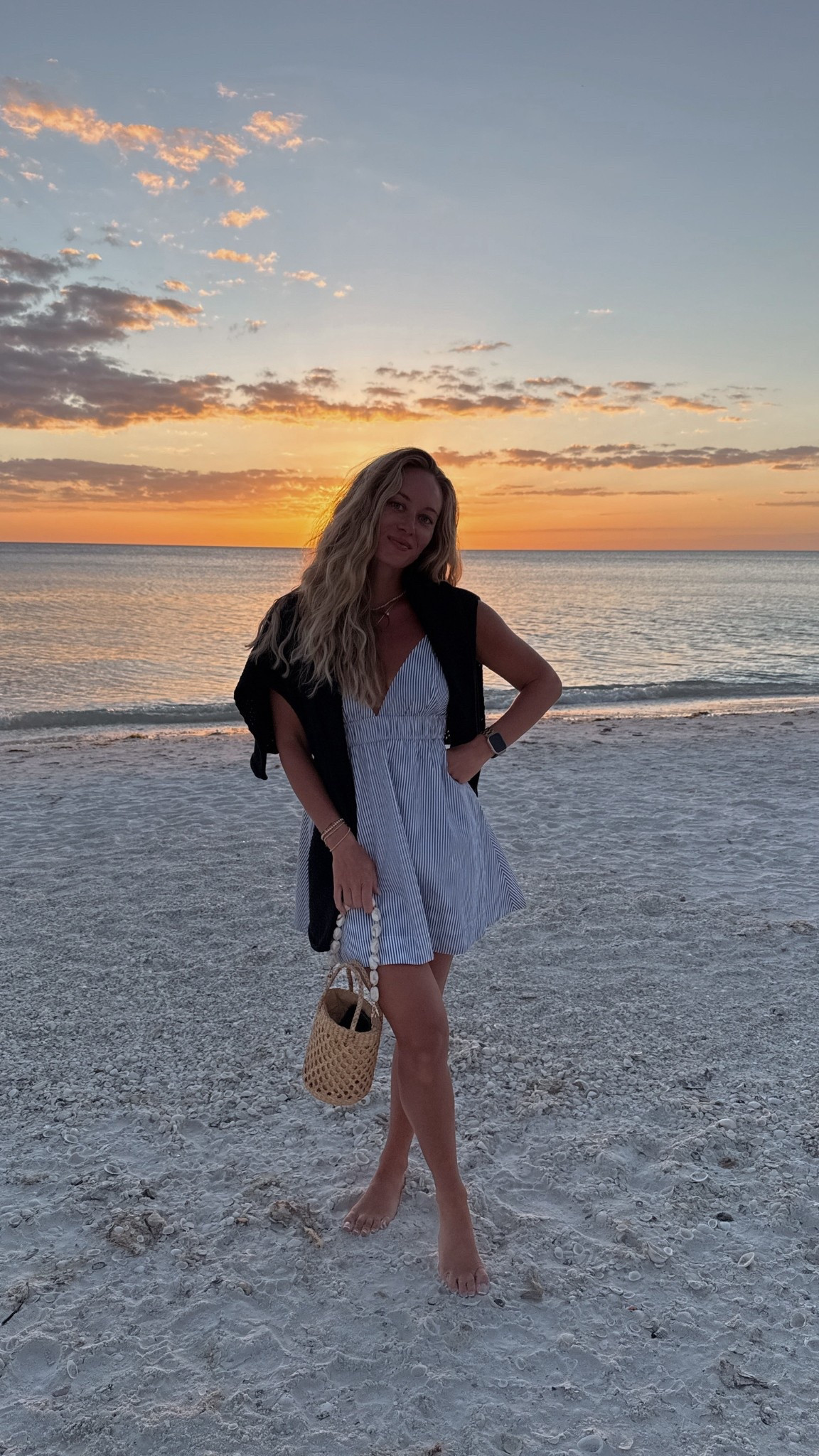 Sunset beach dinner OOTD - wearing aritzia cotton poplin dress with cotton @frankandeileen sweater. Love this little bag with the shell strap! 🐚

Elevated essentials, casual dinner outfit, spring outfit, vacation outfit 

#LTKSeasonal #LTKootd