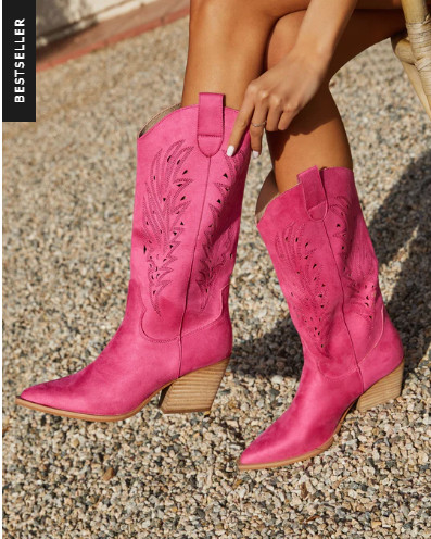 The boots that make every outfit a moment 💖✨

If you’ve been wanting to add a fun statement piece to your wardrobe… these are IT.

The hot pink color is bold (in the best way), and the laser-cut detail gives them that extra elevated, boutique feel. They’re the kind of boots that instantly turn a simple outfit into something styled.

How I’d wear them:
• with a white dress for the cutest contrast
• denim shorts + a graphic tee
• a flowy maxi for that western-boho vibe
• dressed up for concerts, bachelorettes, or girls trips

Fit + details:
– mid-calf height with a flattering shape
– 3” block heel = actually walkable ()
– slip-on style with pull tabs (easy on/off) ()
– suede + leather mix gives that elevated look ()

They’re one of those pieces that get compliments every single time you wear them… and make your outfit feel way more fun.

#LTKStyle #LTKSeasonal #WesternStyle #CowgirlStyle #StatementBoots #ConcertOutfit #BacheloretteOutfit #LTKFinds  

 #LTKFestival #LTKgrwm #LTKootd