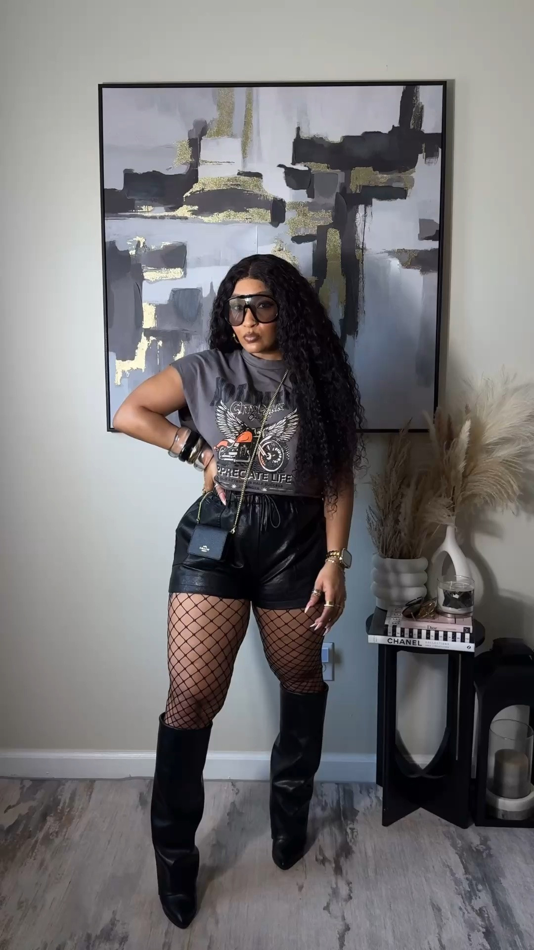 Leather shorts and a graphic tee for the perfect concert look! Fishnets add the perfect edge, but feel free to leave them off if it’s not for you. These boots have a chunky heel that’s comfortable to walk and stand in! Are you team sneakers or team boots? 
Everything: Medium

#LTKootd #LTKgrwm #LTKSeasonal