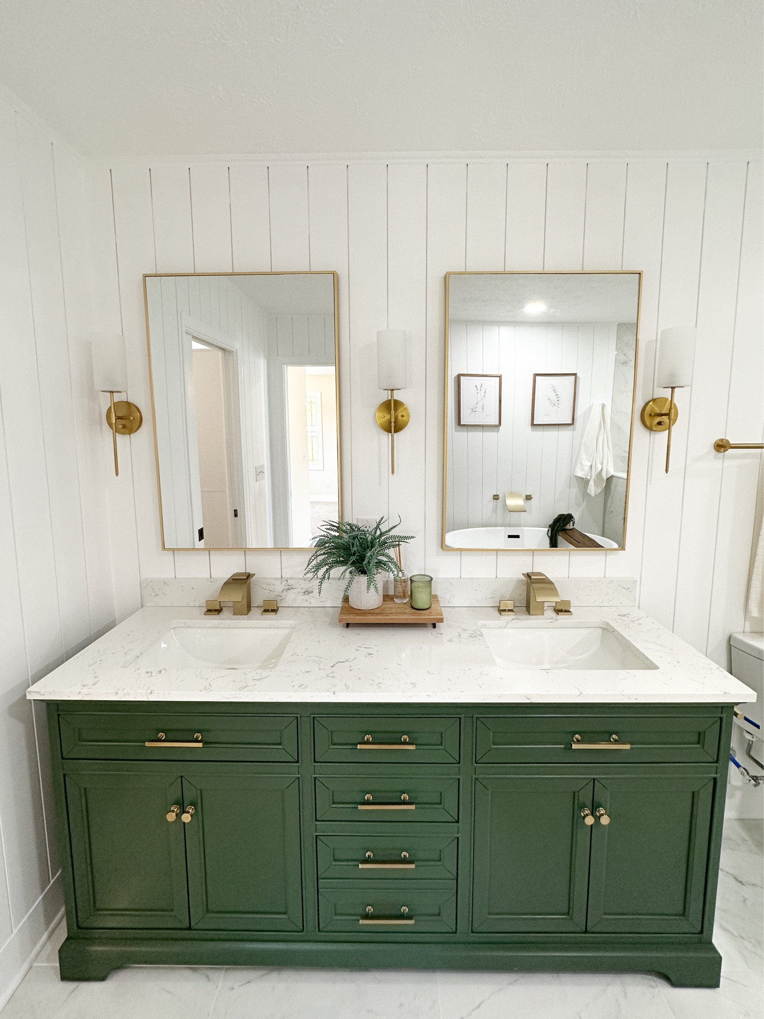 Master suite // green vanity // marble floor // bathroom remodel 