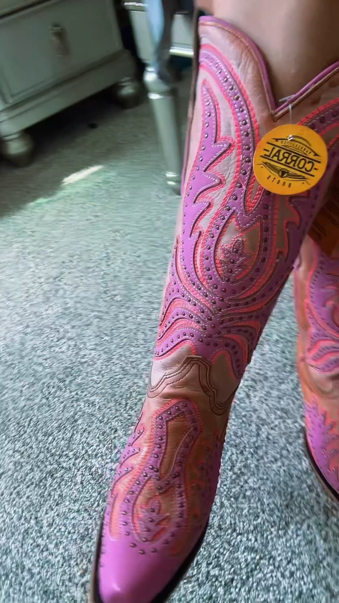 OBSESSED 🩷🧡😭 These boots have a beautiful pink & studded design, a pop of turquoise inside & they even glow under black light with the standout orange stitching 🥹 The tiny details are always the best! 🥰🎉🤠 The craftsmanship of Corral western boots is incredible 🙌🏼😍

#LTKootd #LTKMothersDay #LTKFestival