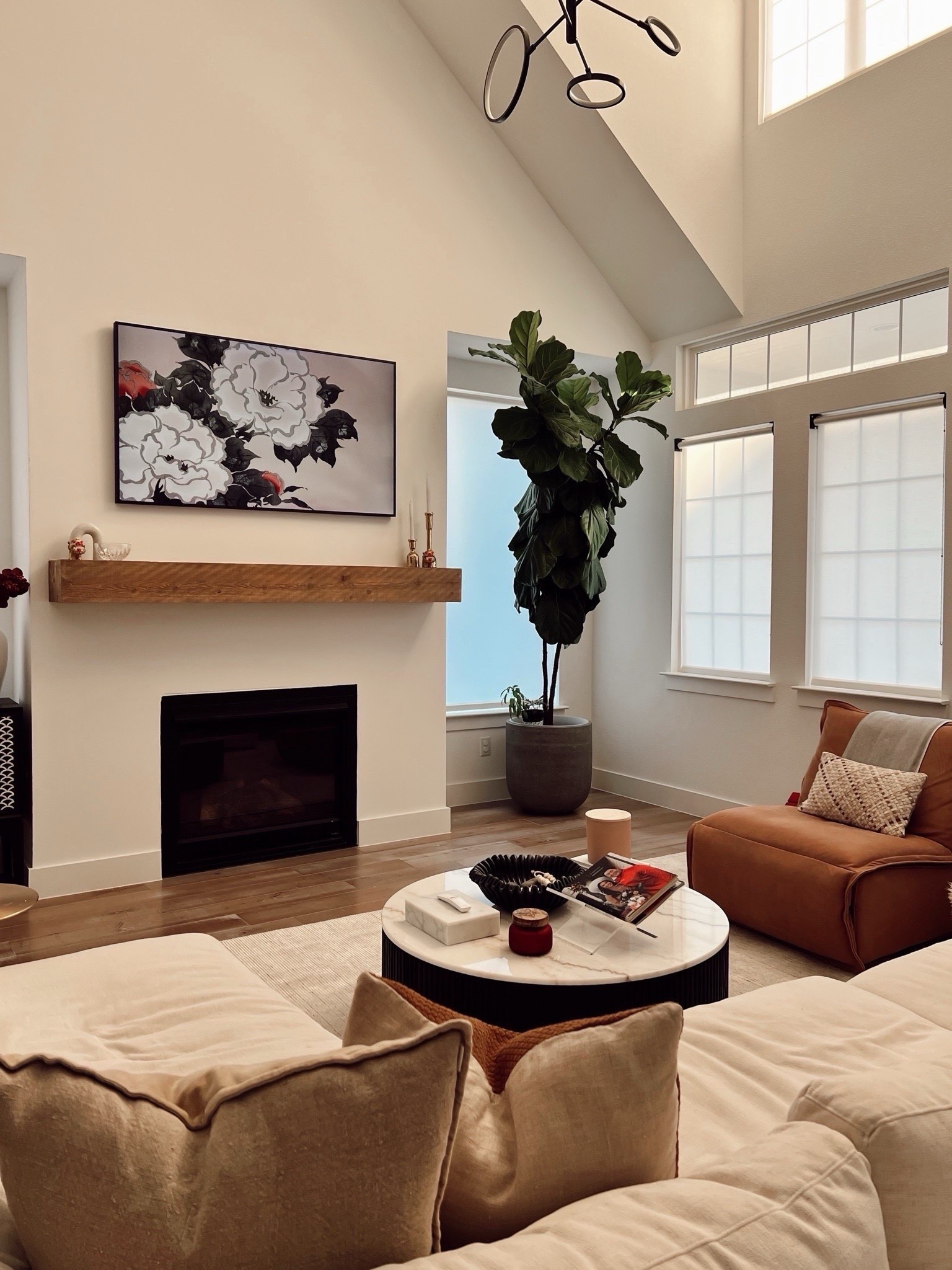 Living room decor with Samsung frame tv art for lunar new year. Love the subtle Asian nod. Linking our leather recliner, marble fluted coffee table, the best white sectional sofa and area rug, all from Arhaus  


#LTKHome