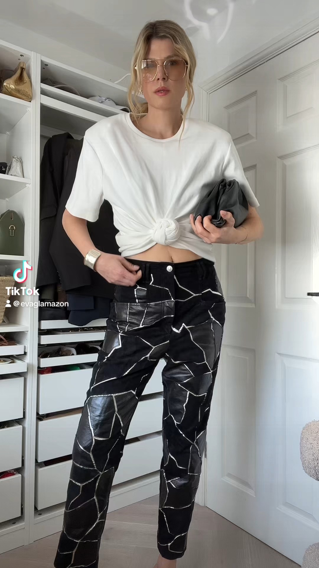 Spring outfit, leather trousers, cropped tshirt, knot tshirt, Isabel marant trousers, Bottega clutch, alaia heels, kitten heels, Magda butrym tshirt 

#LTKsummer #LTKspring #LTKeurope