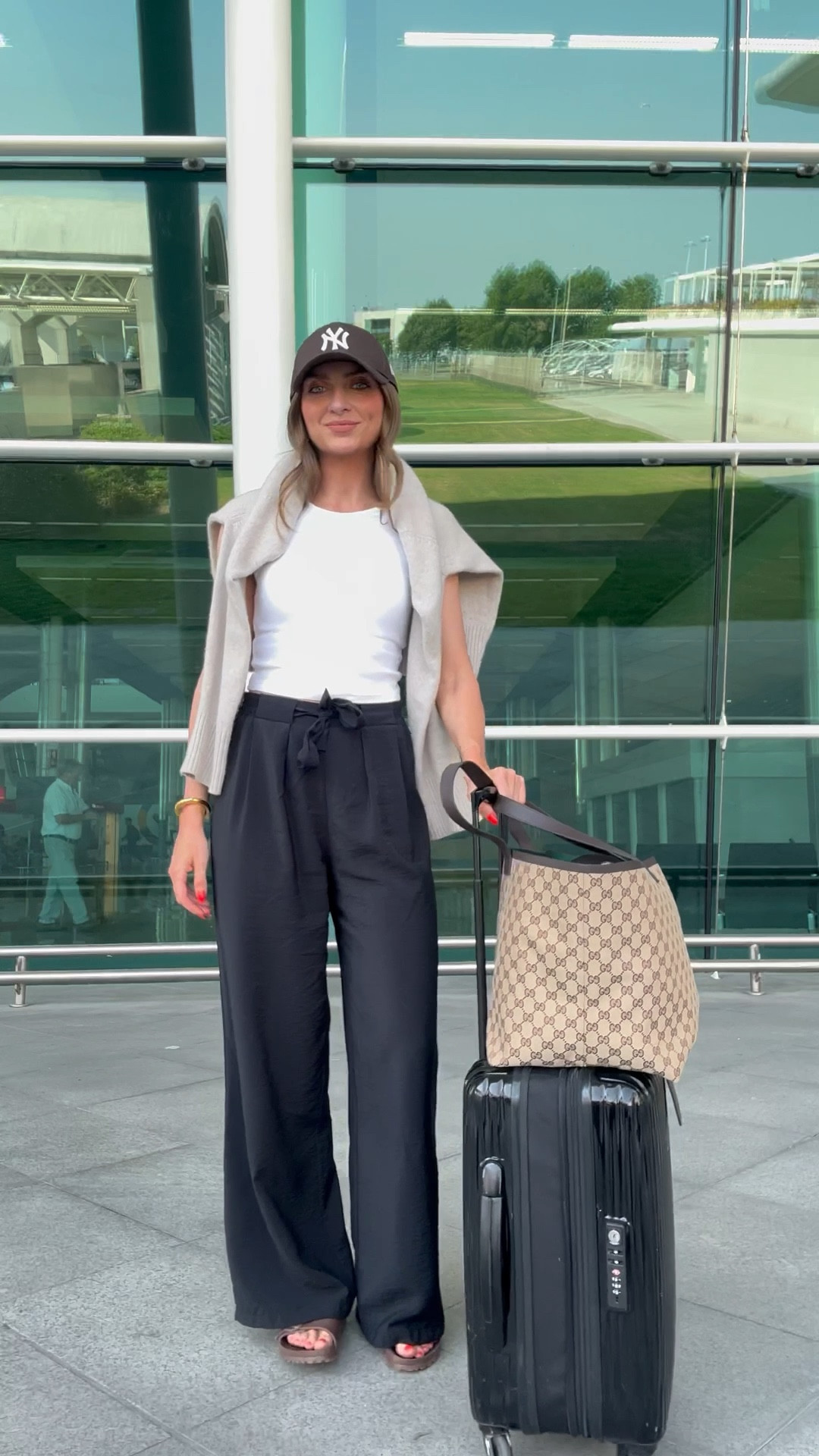 Airport outfit ✈️ 
Small in the Uniqlo bra top
8 31 leg in the black matalan trousers
I’m 5ft 6 for an idea of the length 
Cream jumper is older so I’ve linked similar
Brown Birkenstock Eva Arizona sandals
Brown cap 
Gucci tote bag 
Black suitcase 

#LTKtravel #LTKsummer #LTKuk