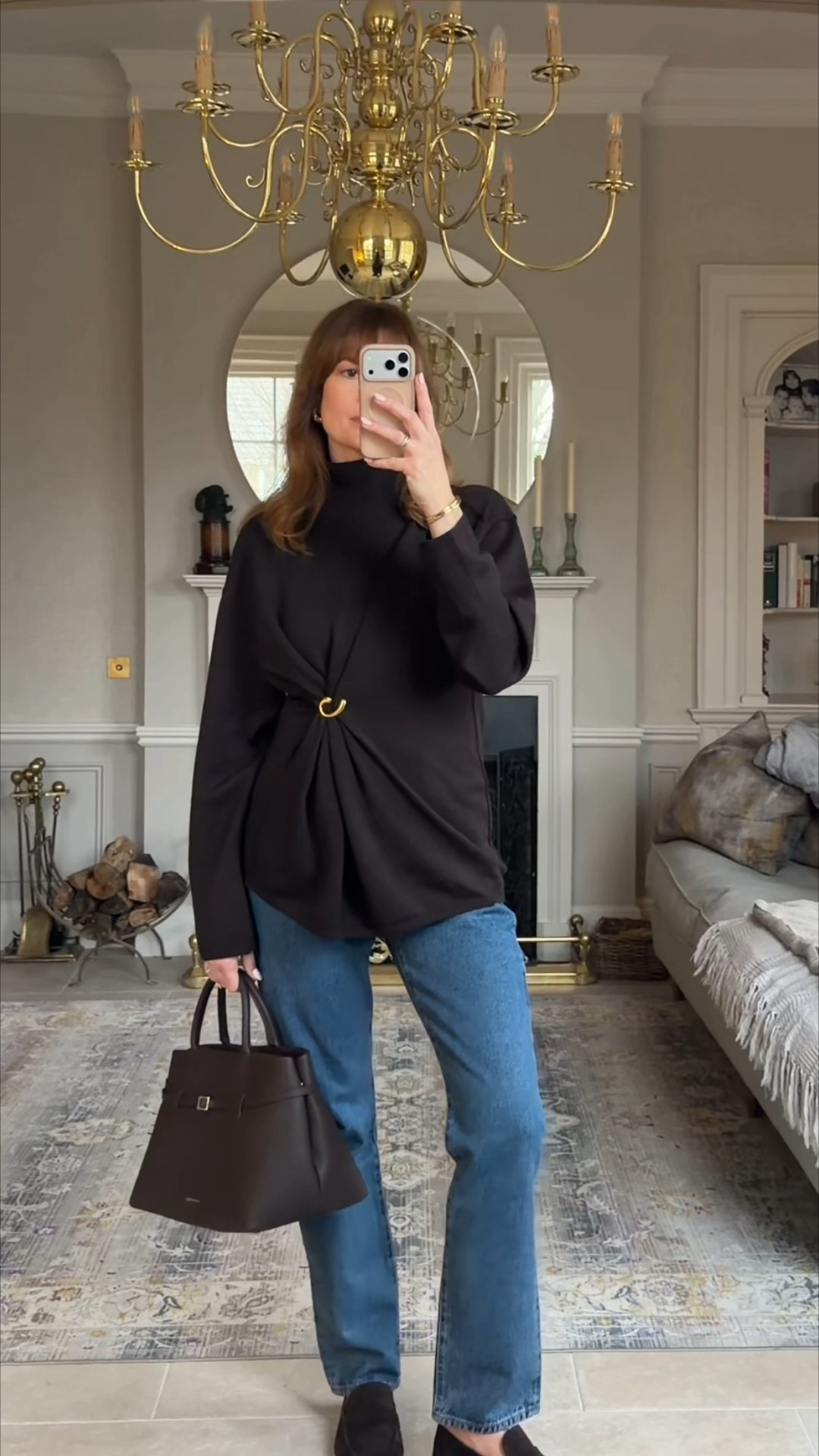 Using a brooch to cinch the waist and create definition 

#LTKwinter #LTKuk #LTKstyletip
