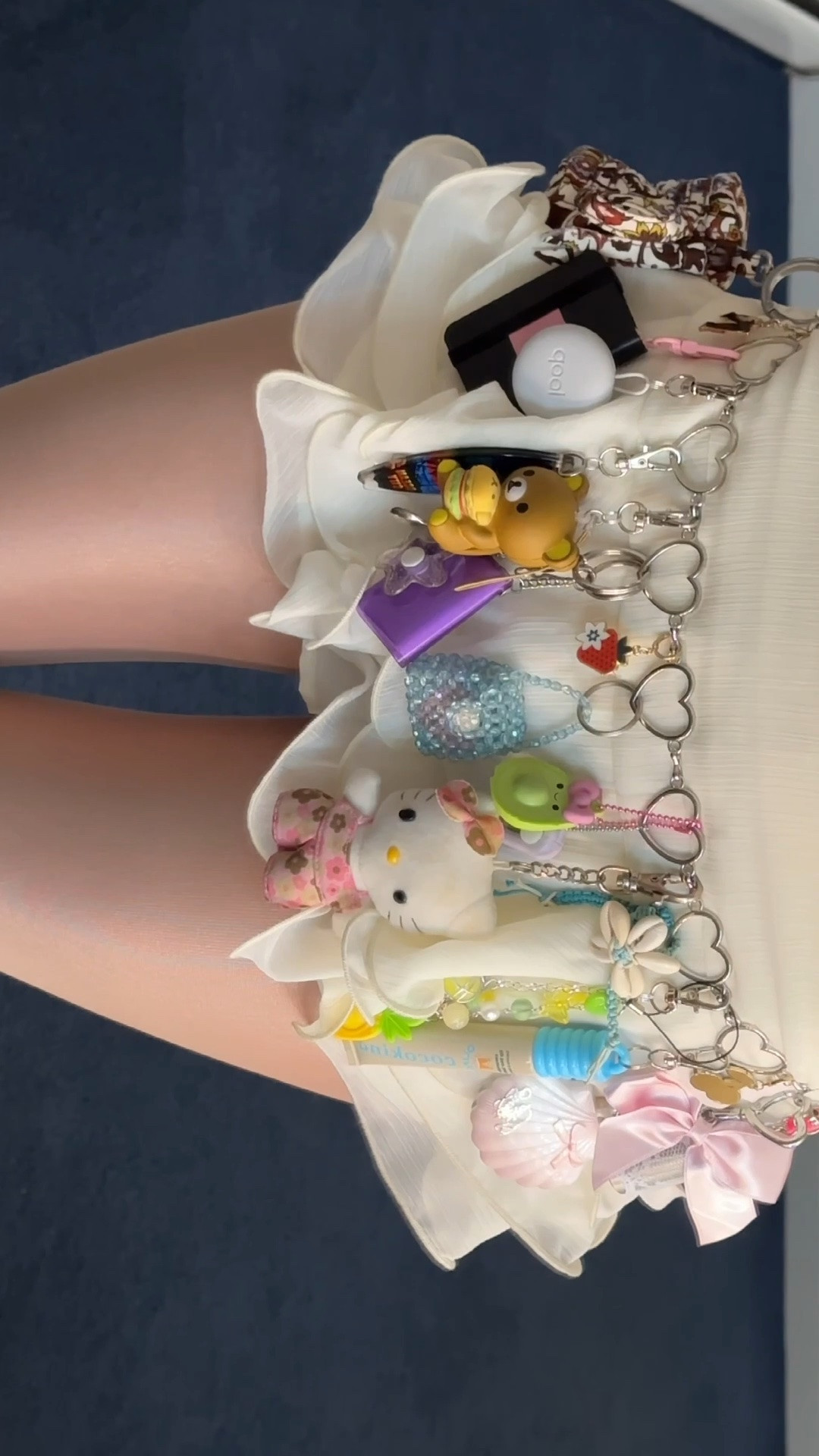 BEST lip gloss for making diy keychains imo 💋 love that you don’t have to unclip it from your keychain to use it! @cocokind @OLIPOP 

skirt: @shopcider (c0de: WELLERMEGS15)
top: @edikted

my hair looks so bad in this but we’re just gonna ignore that 🫠

#lipbalmkeychain #zaralarsson #bagcharms #diyfashion #keychain

#LTKgrwm #LTKselfcare #LTKSeasonal