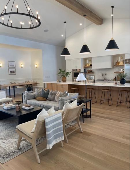 The open concept in this room is amazing! It’s so functional and stylish!

Dining room/lighting/sofa/accent chairs/accent pillows/dining chairs/stools/chandelier/throw blanket

#LTKU #LTKstyletip #LTKhome