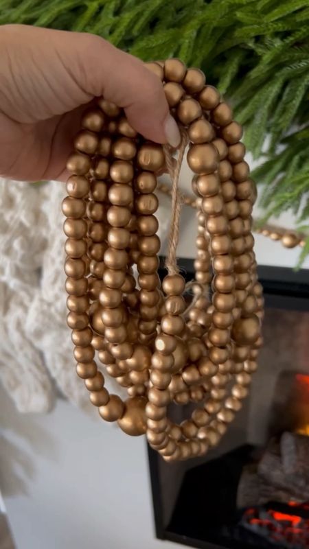 I used this beautiful gold beaded garland on my holiday mantel and on my Christmas tree. I used one strand here and three on my 7 ft tree. 

Christmas decor, tree garland, bead garland, holiday decor, Christmas tree trimming 

#LTKHoliday #LTKhome #LTKfindsunder50