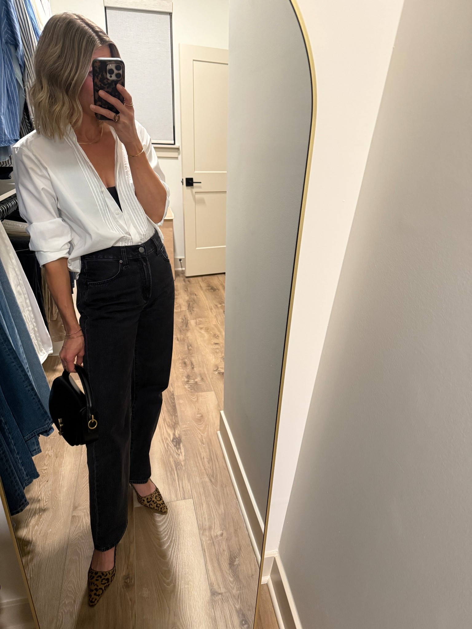 Wearing small tuxedo blouse, 25/regular jeans (sized down one), heels tts

#LTKFindsUnder100 #LTKOver40 #LTKStyleTip